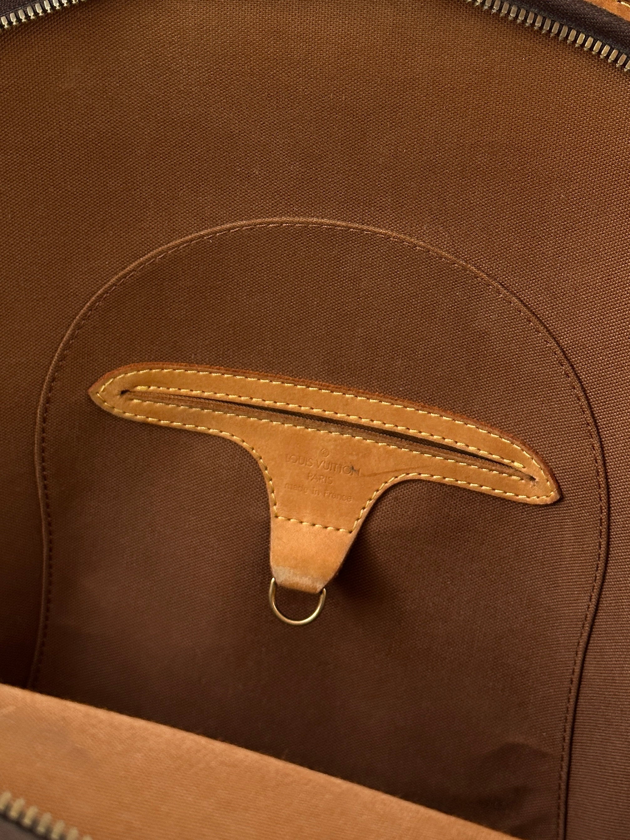 Louis Vuitton 1997 Ellipse Shoulder Bag in monogram canvas with leather accents and adjustable shoulder strap.