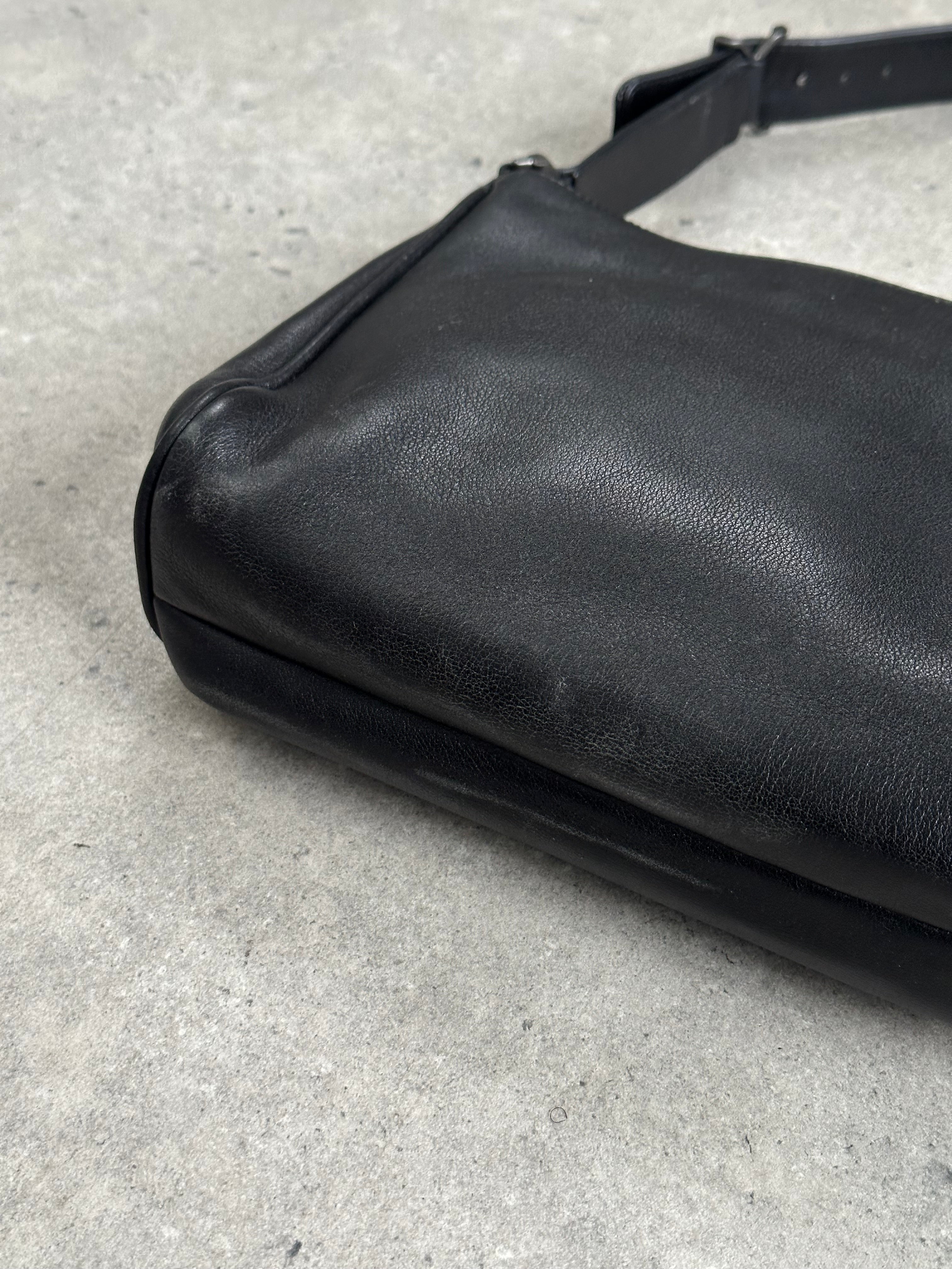 Giorgio Armani 2000s leather shoulder bag with sleek design and structured silhouette, featuring a top handle and subtle branding.