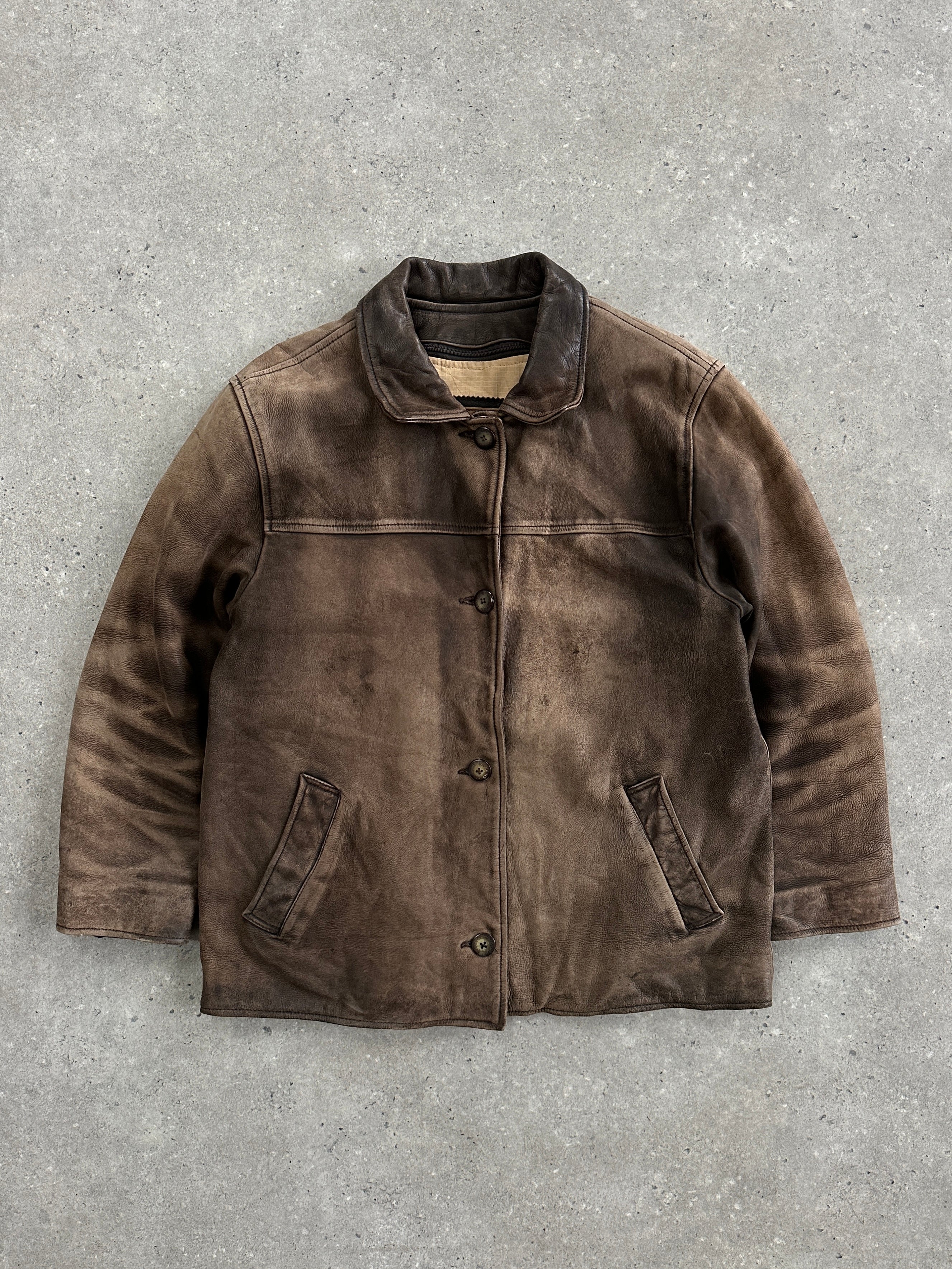 Vintage 1990s distressed leather jacket for men, featuring a rugged, worn-in look and classic style.