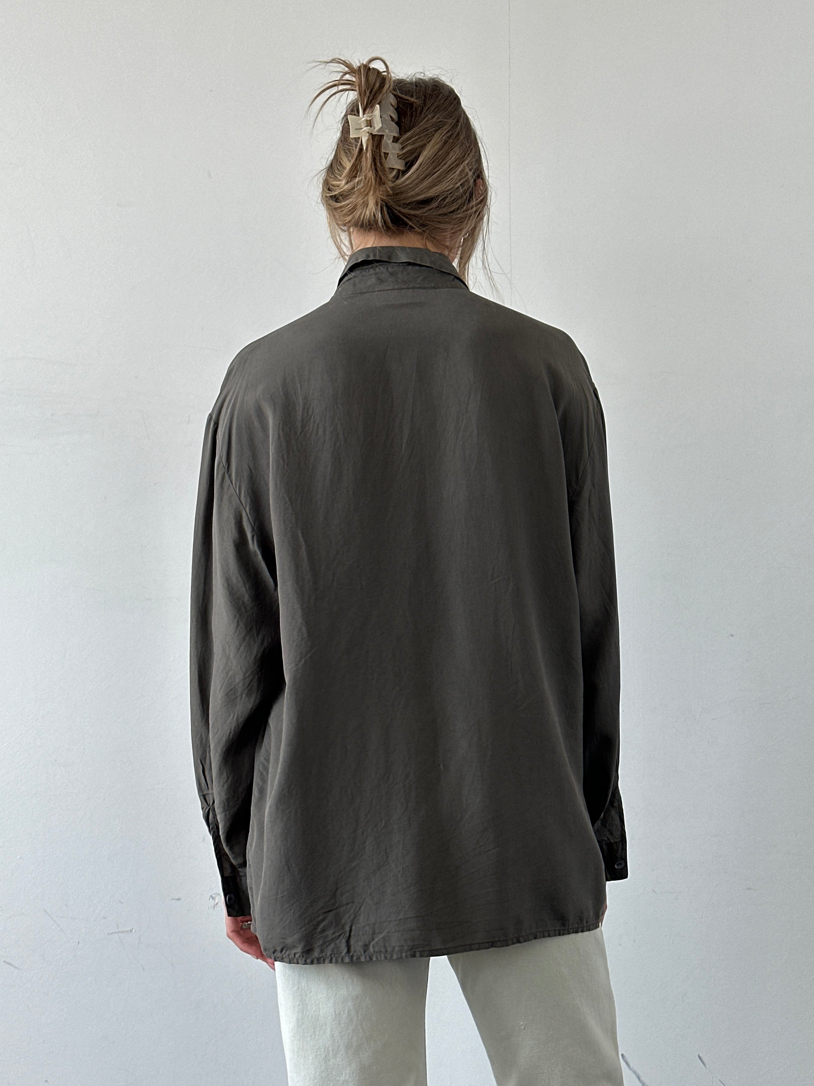Italian Vintage Pure Silk Concealed Placket Shirt in size XL, showcasing its elegant design and smooth silk fabric.