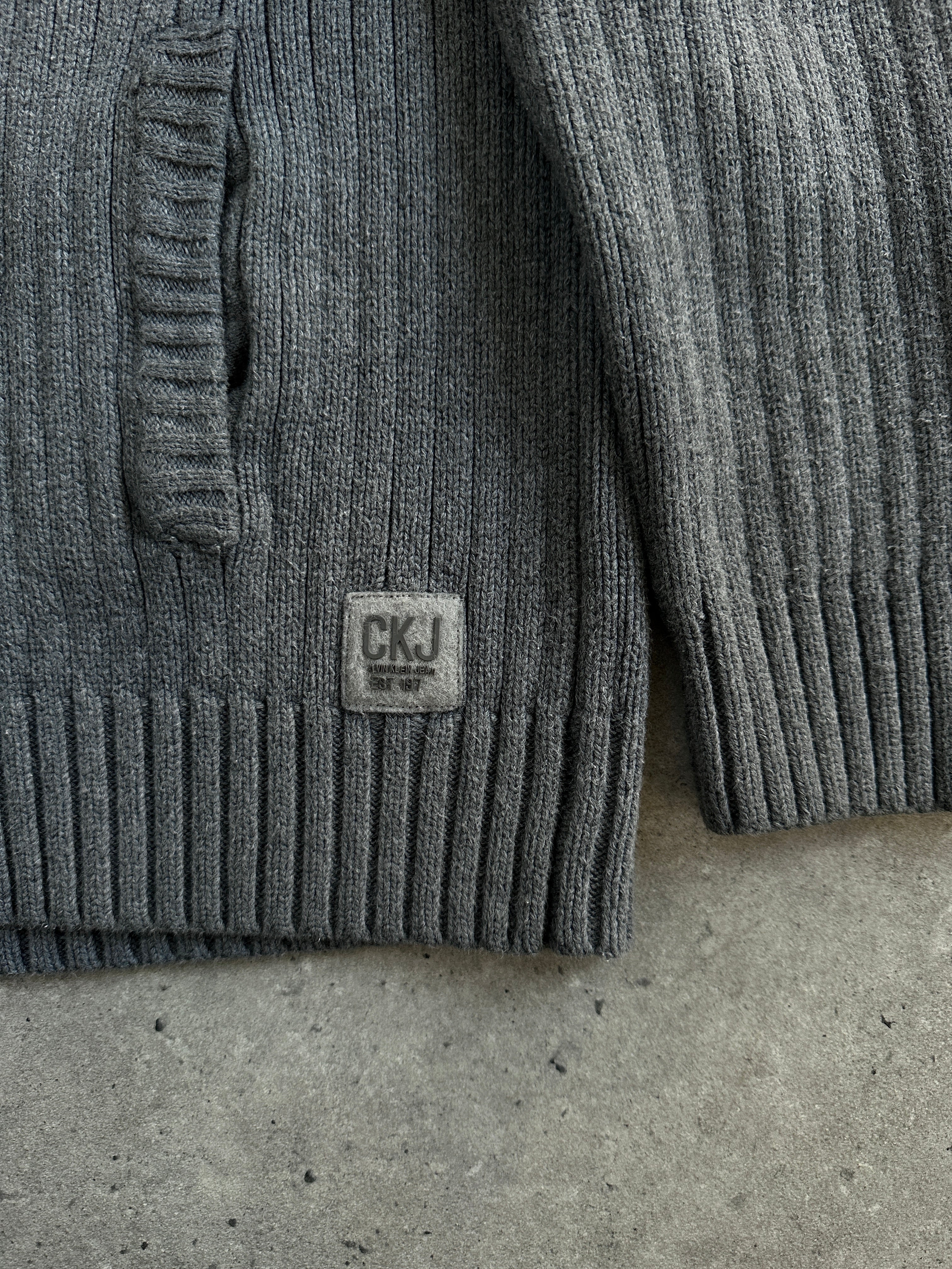 Calvin Klein Jeans 2000s pure cotton ribbed cardigan in size M/L, featuring a soft knit texture and classic button closure.