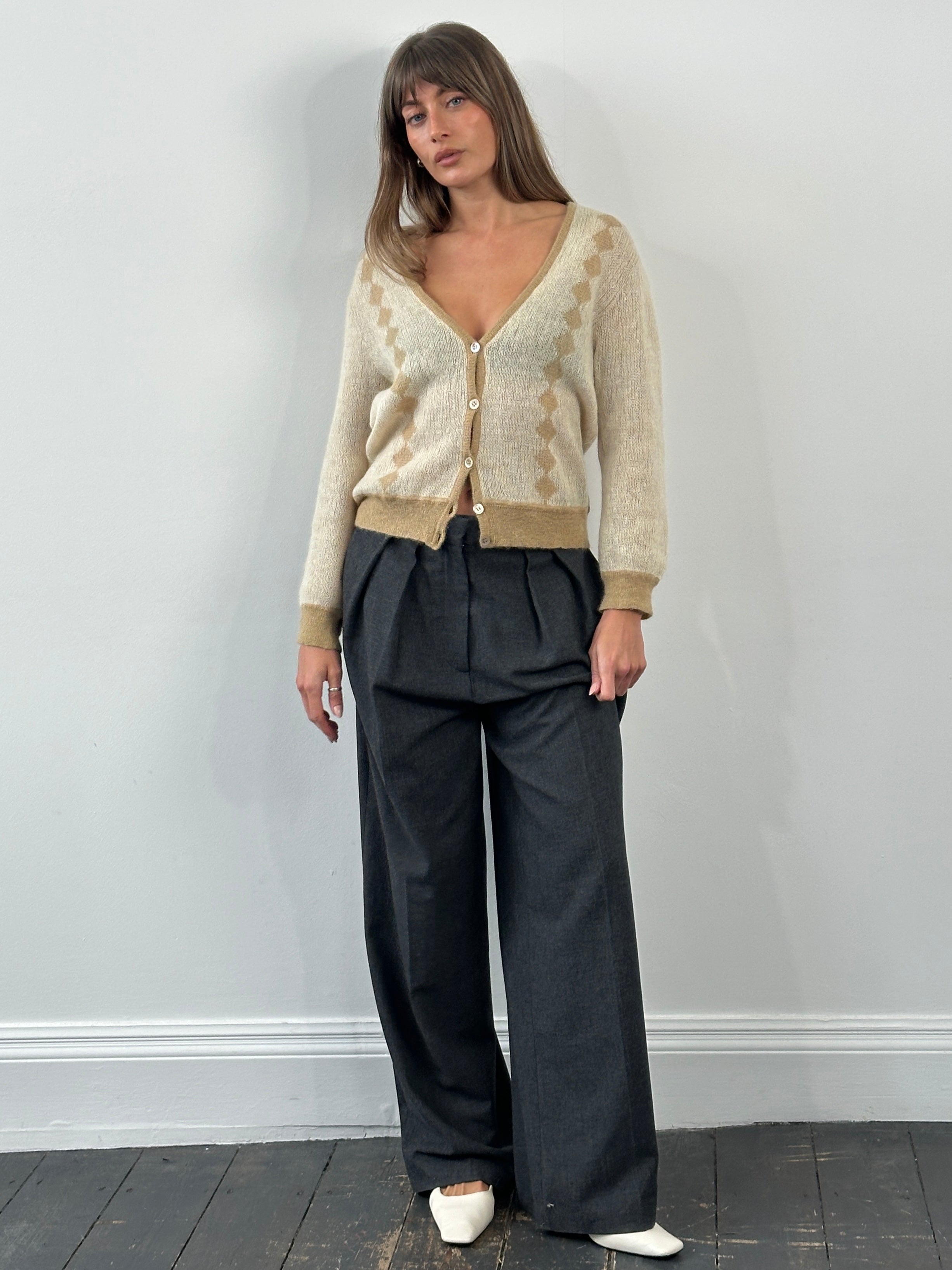 Vintage Italian 1980s mohair cardigan in S/M, featuring a retro knit design and classic style.