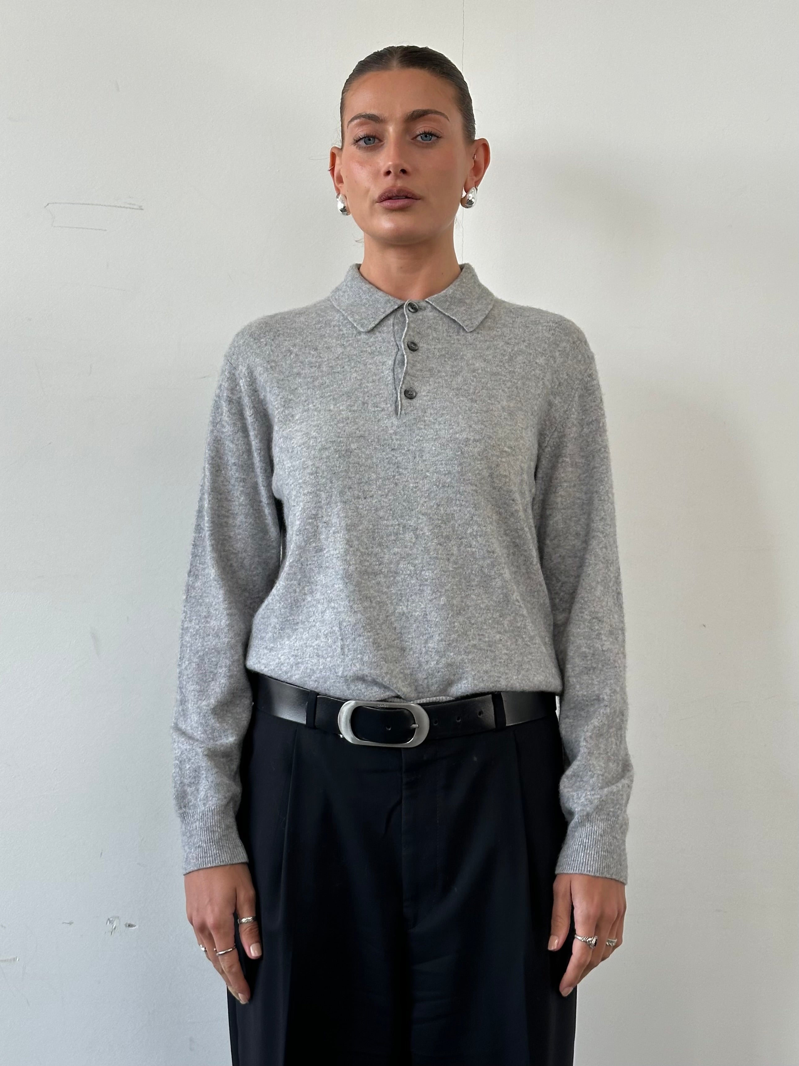 Vintage men's merino wool cashmere polo jumper in size M, featuring a classic knit design and ribbed collar.