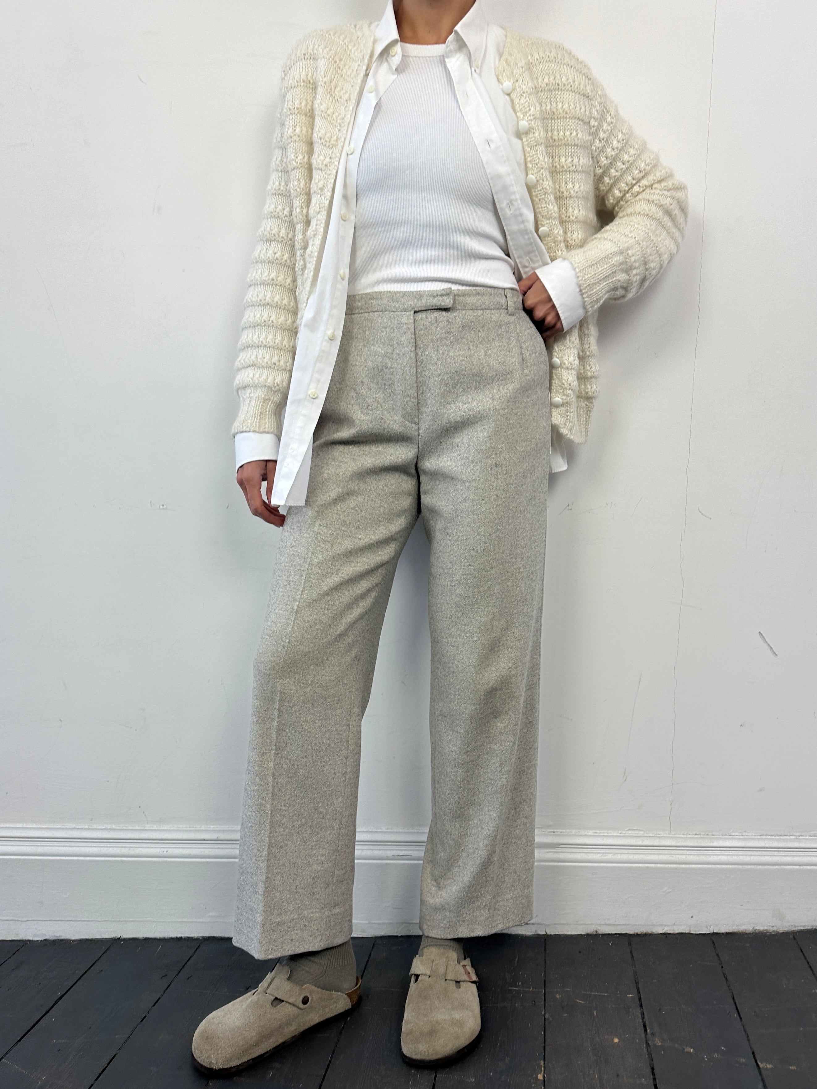 Jaeger wool silk mid waist straight leg trousers in W28, featuring a tailored fit and classic design, displayed on a hanger.