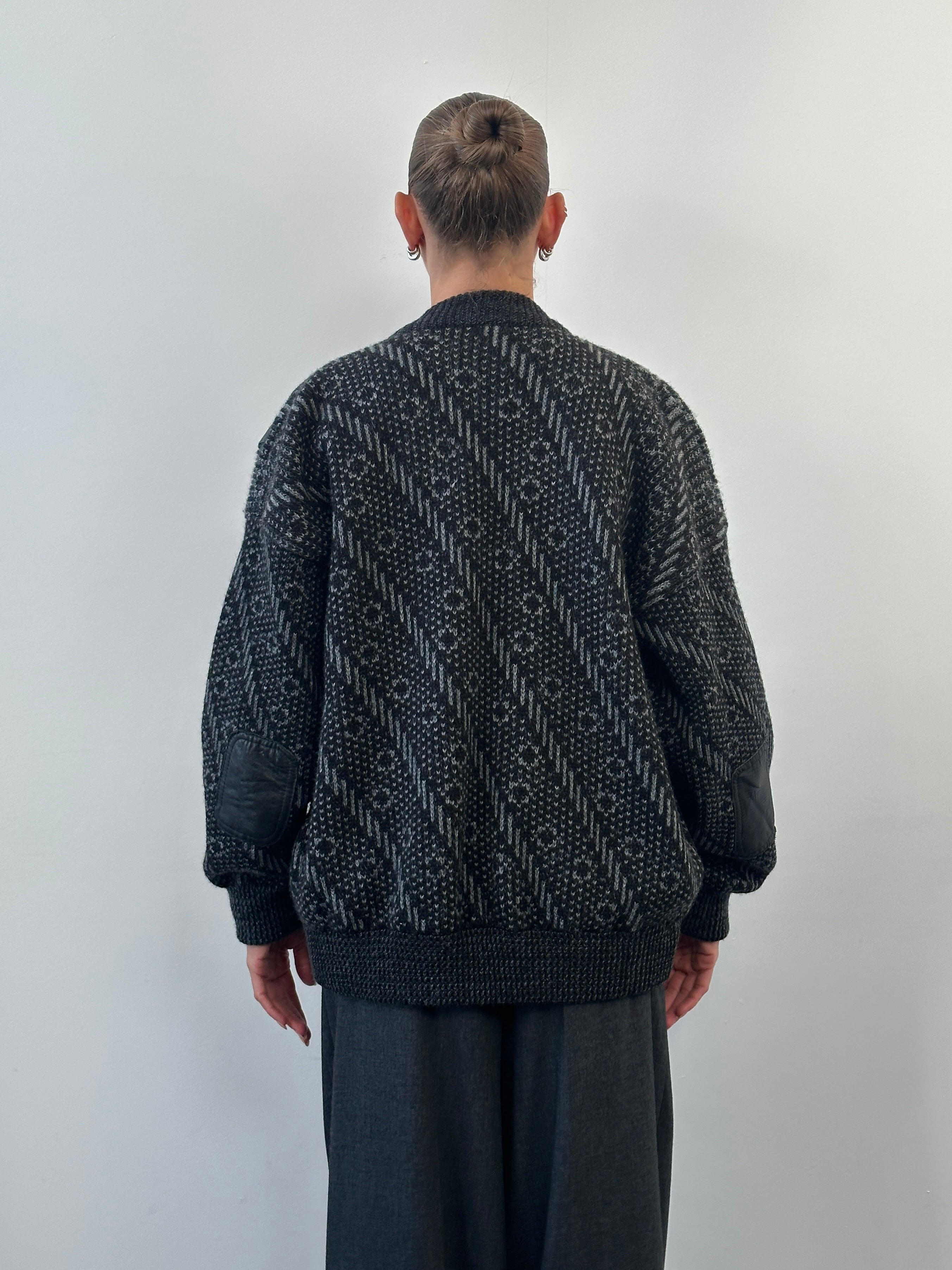 Vintage 1980s wool print knit bomber jacket in XL, featuring retro patterns and a classic bomber style.