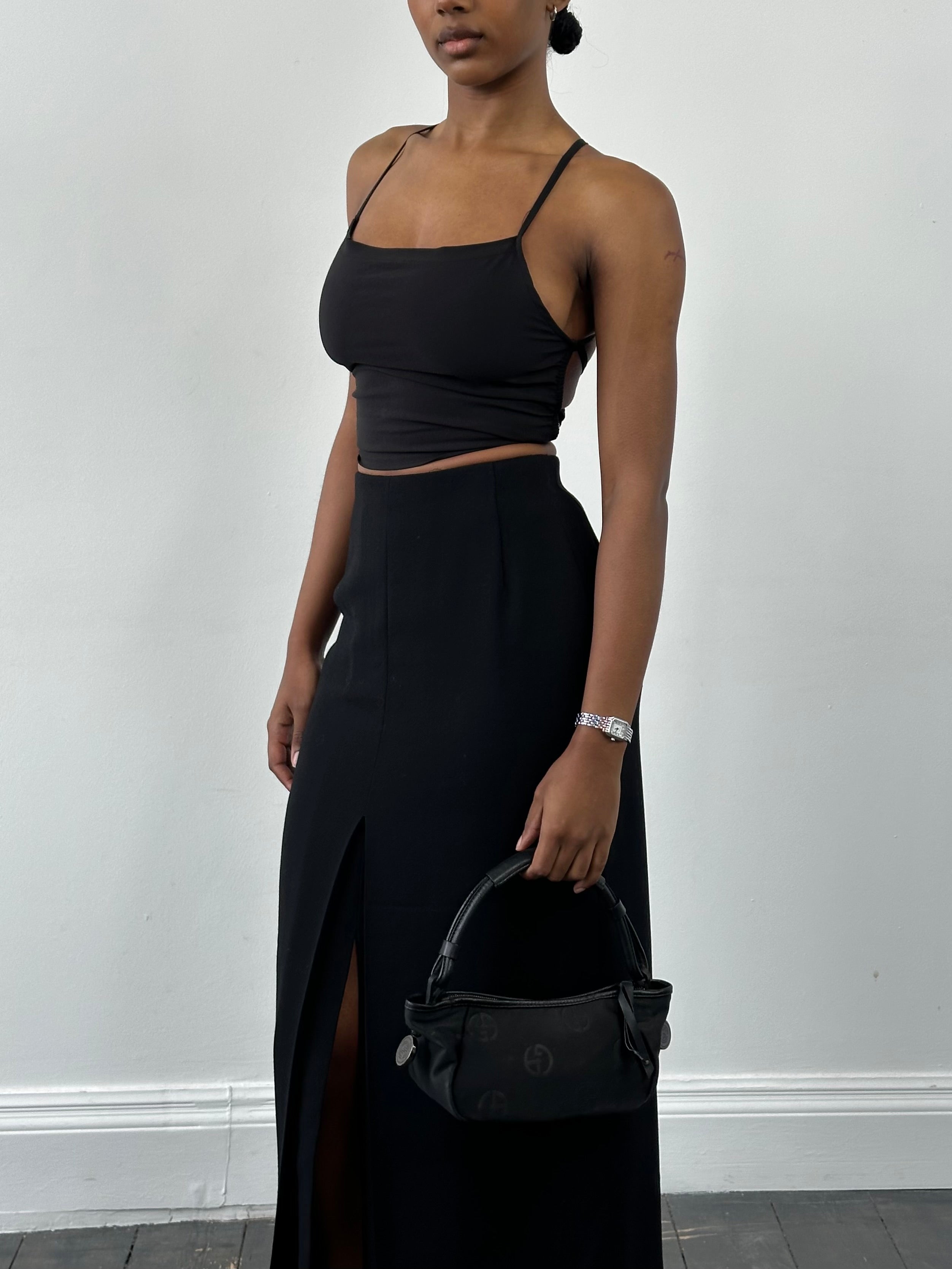 Jaeger 1990s pure wool side split maxi skirt in deep navy, featuring a high waist and elegant flowy design.