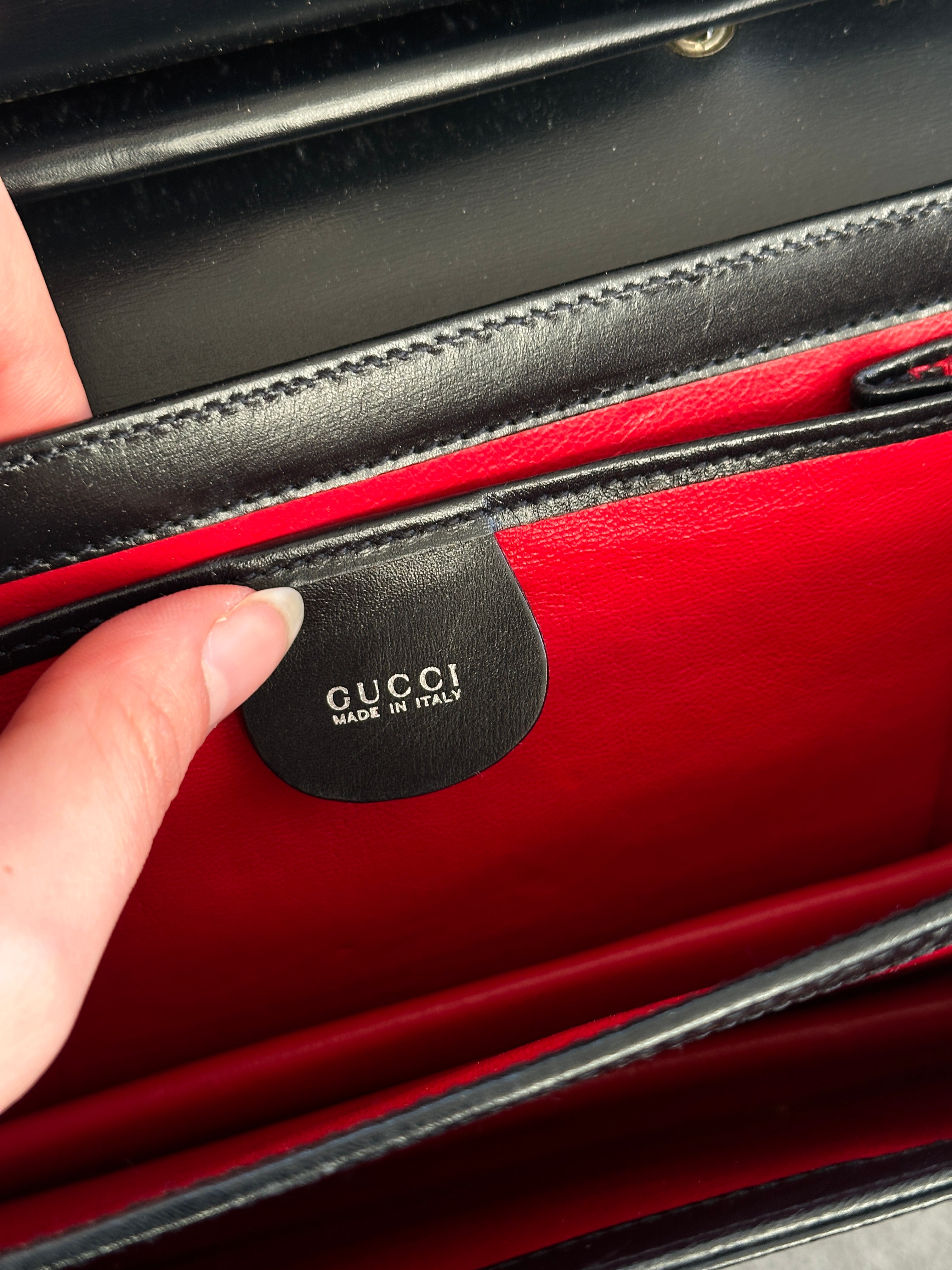 Gucci 1990s Tom Ford Square G leather handbag with structured design and top handle, featuring signature Gucci detailing.