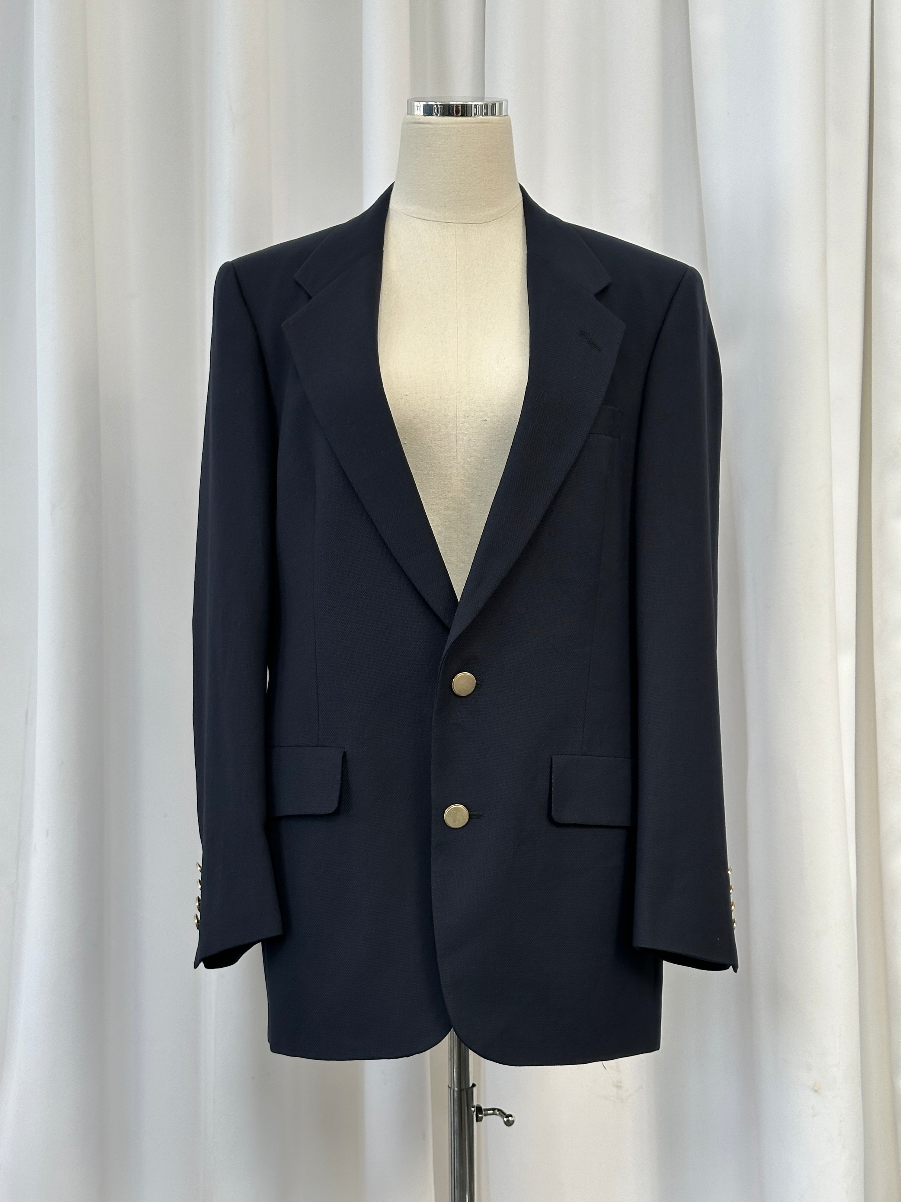 Christian Dior Monsieur 1980s pure wool bespoke blazer, 38R/M, tailored fit, classic design with buttons, dark color, detailed fabric texture.