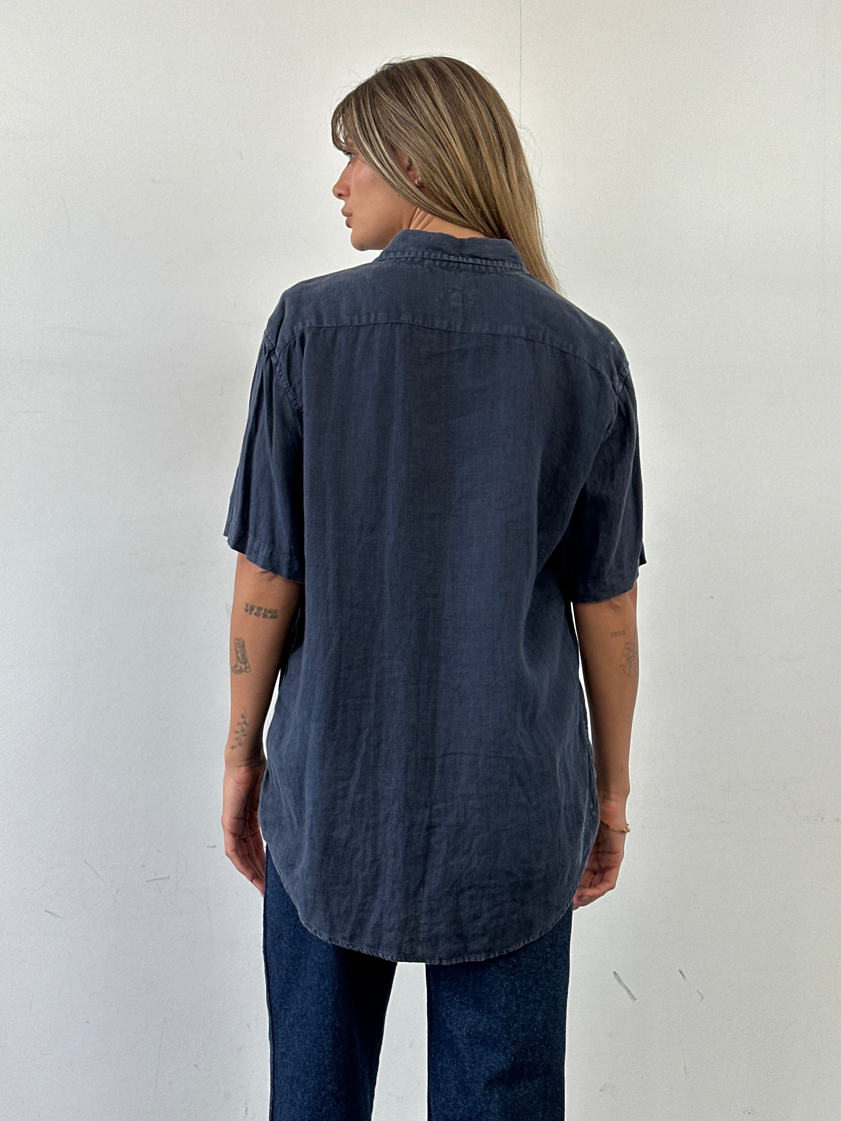 Armani Jeans pure linen short sleeve shirt in size L, featuring a classic collar and lightweight fabric, displayed flat on a white background.