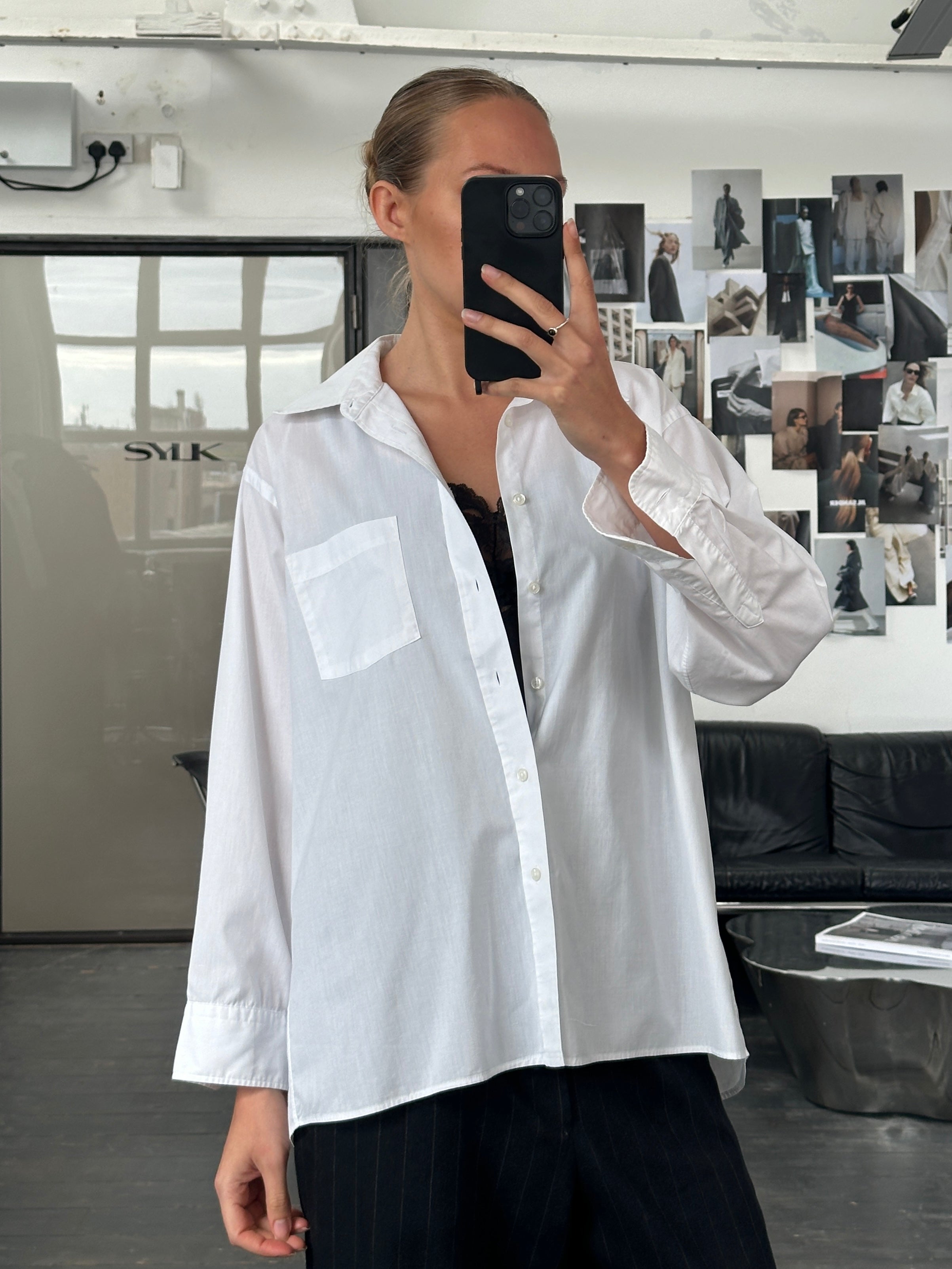 Christian Dior 1980s cotton shirt in size M/L, featuring classic design and tailored fit, displayed on a neutral background.