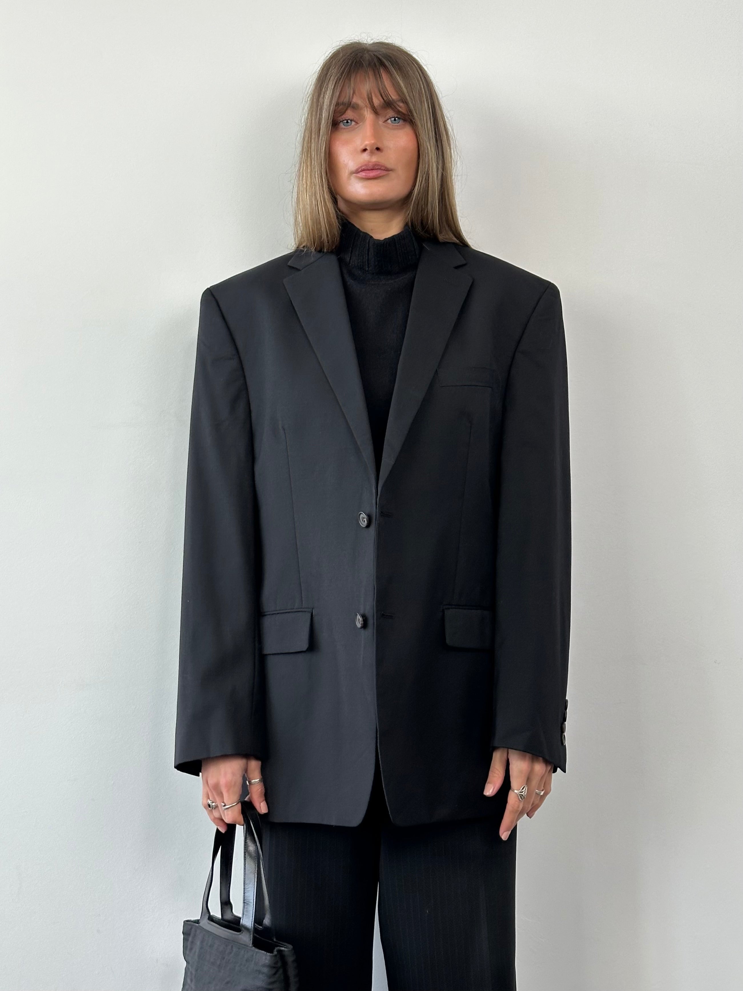 Ralph Lauren pure wool single-breasted blazer in size 42R/XL, dark navy color, tailored fit with notch lapel and front buttons.