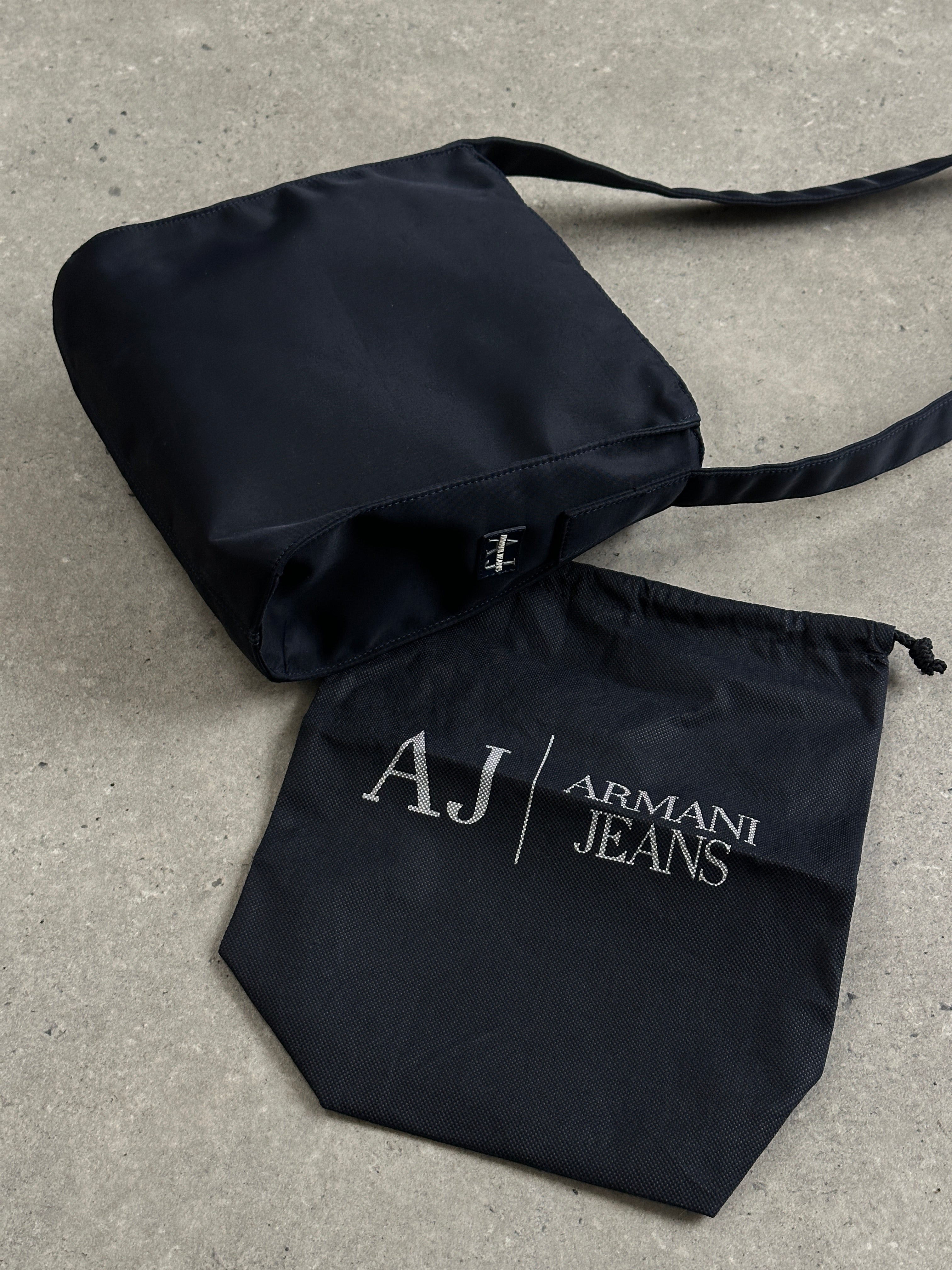 Armani Jeans 2000s nylon shoulder bag with adjustable strap and sleek design, featuring subtle branding and durable material.
