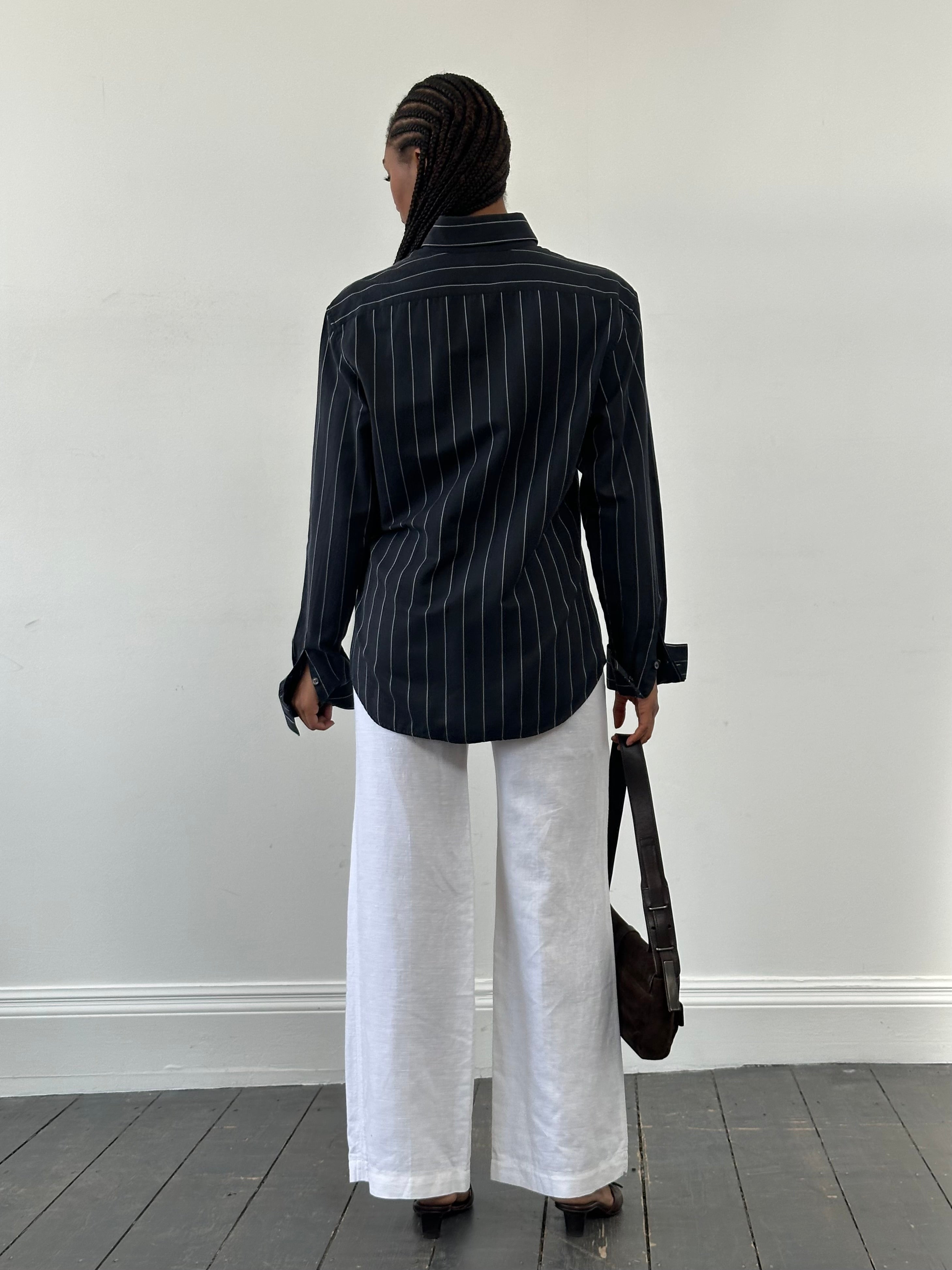Versace Versus 2000s stripe cotton shirt in size M/L, featuring bold colorful stripes and classic collar detail.