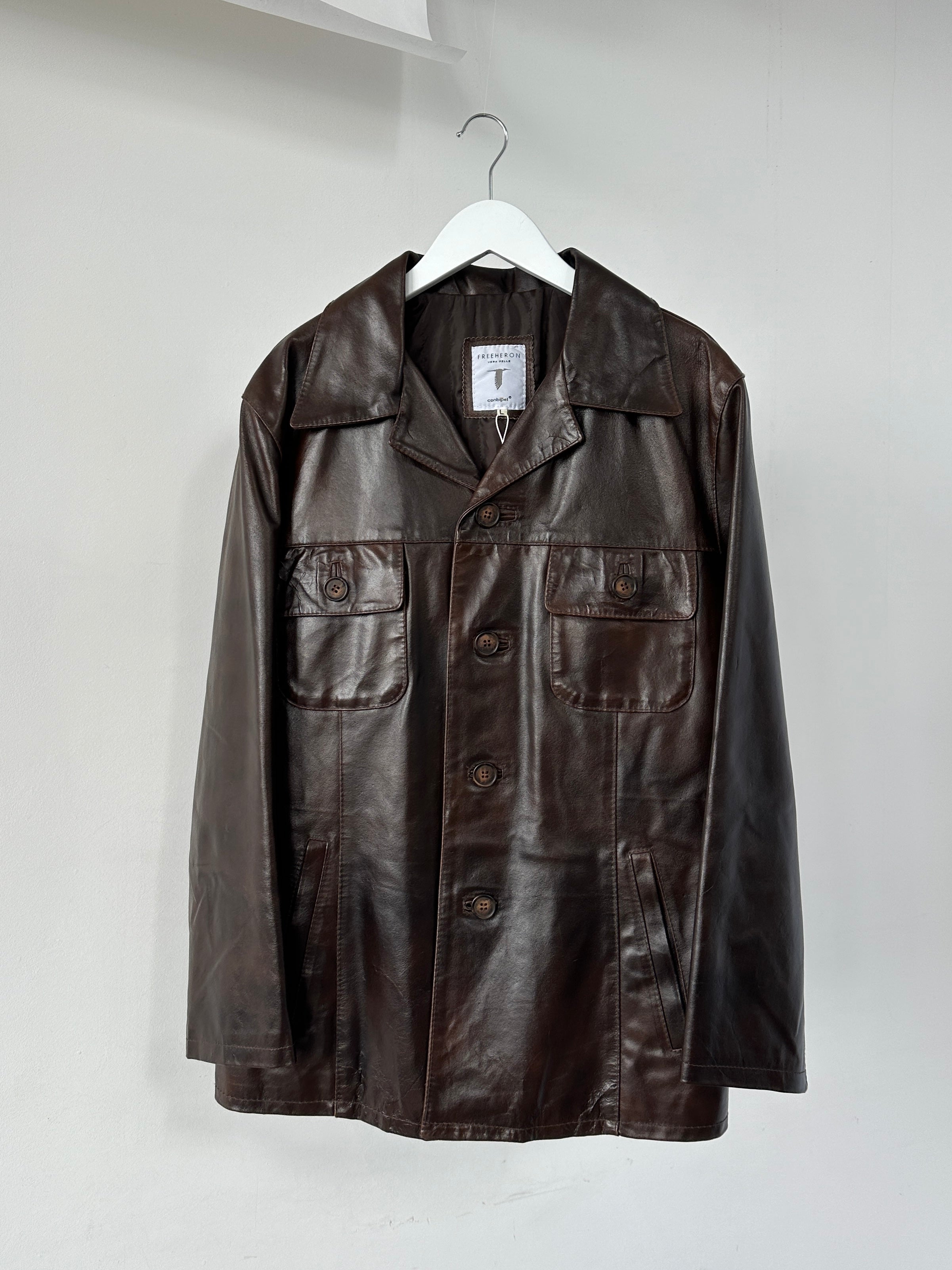 Conbipel boxy leather jacket in size L, featuring a sleek design with a classic collar and zipper front for a stylish look.