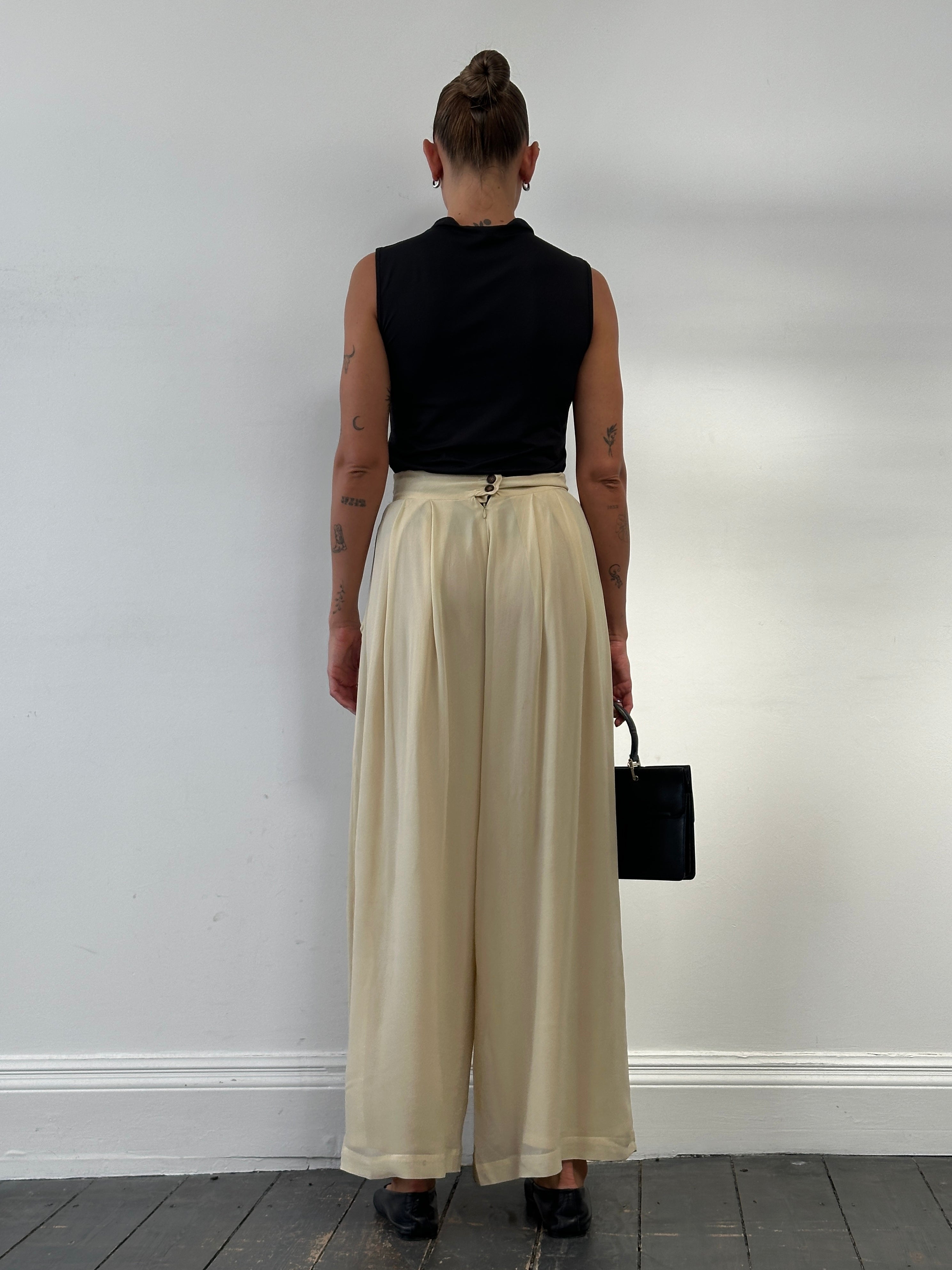 Marella wide-leg high-waisted tailored palazzo trousers in W26, showcasing their flowy fabric and elegant fit.