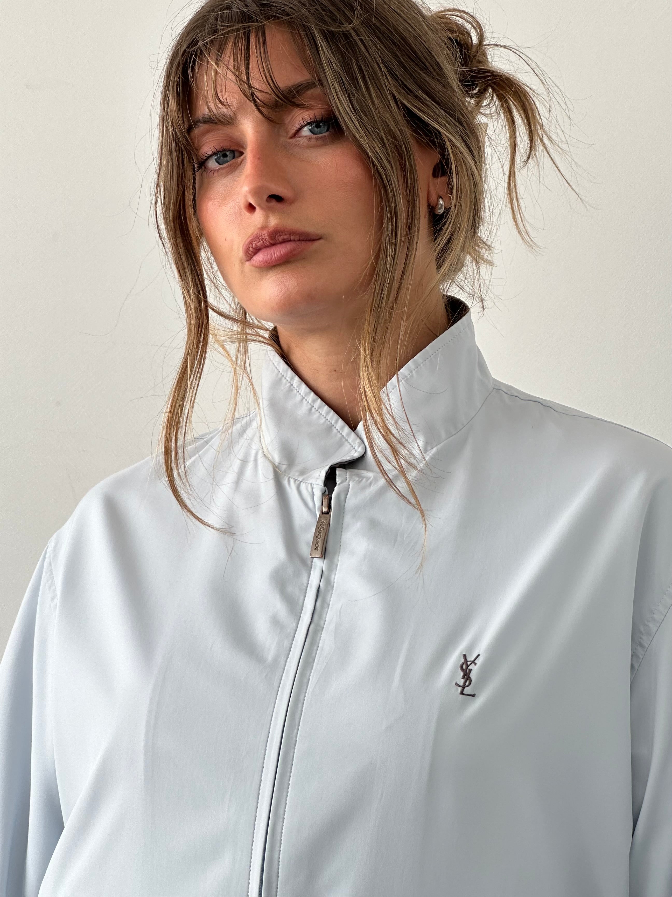 Yves Saint Laurent logo bomber jacket in size M, featuring a sleek design with iconic branding and a stylish fit.