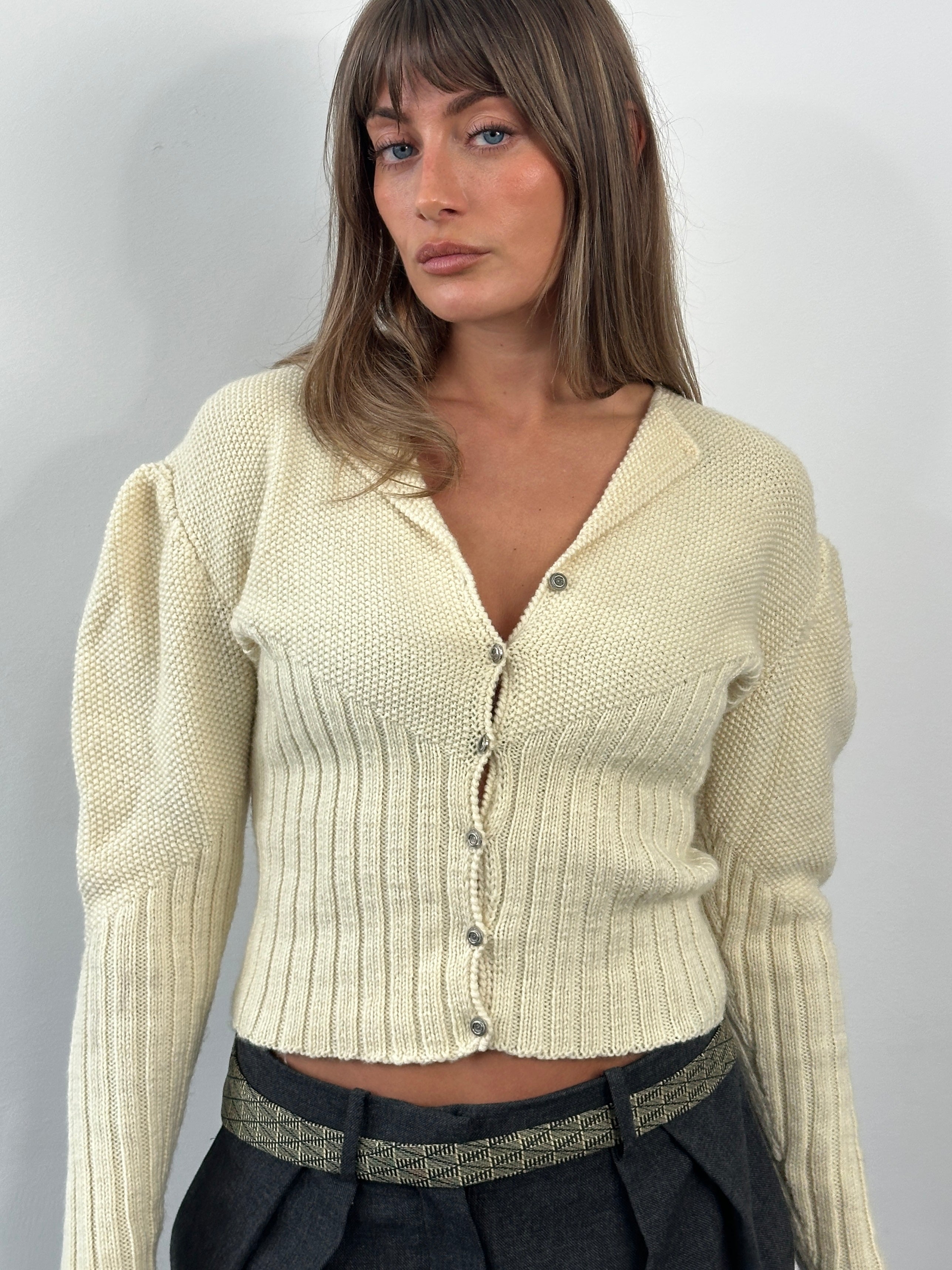 Vintage 1980s wool puff sleeve knitted cardigan in cream with button closure and ribbed cuffs, size S/M.