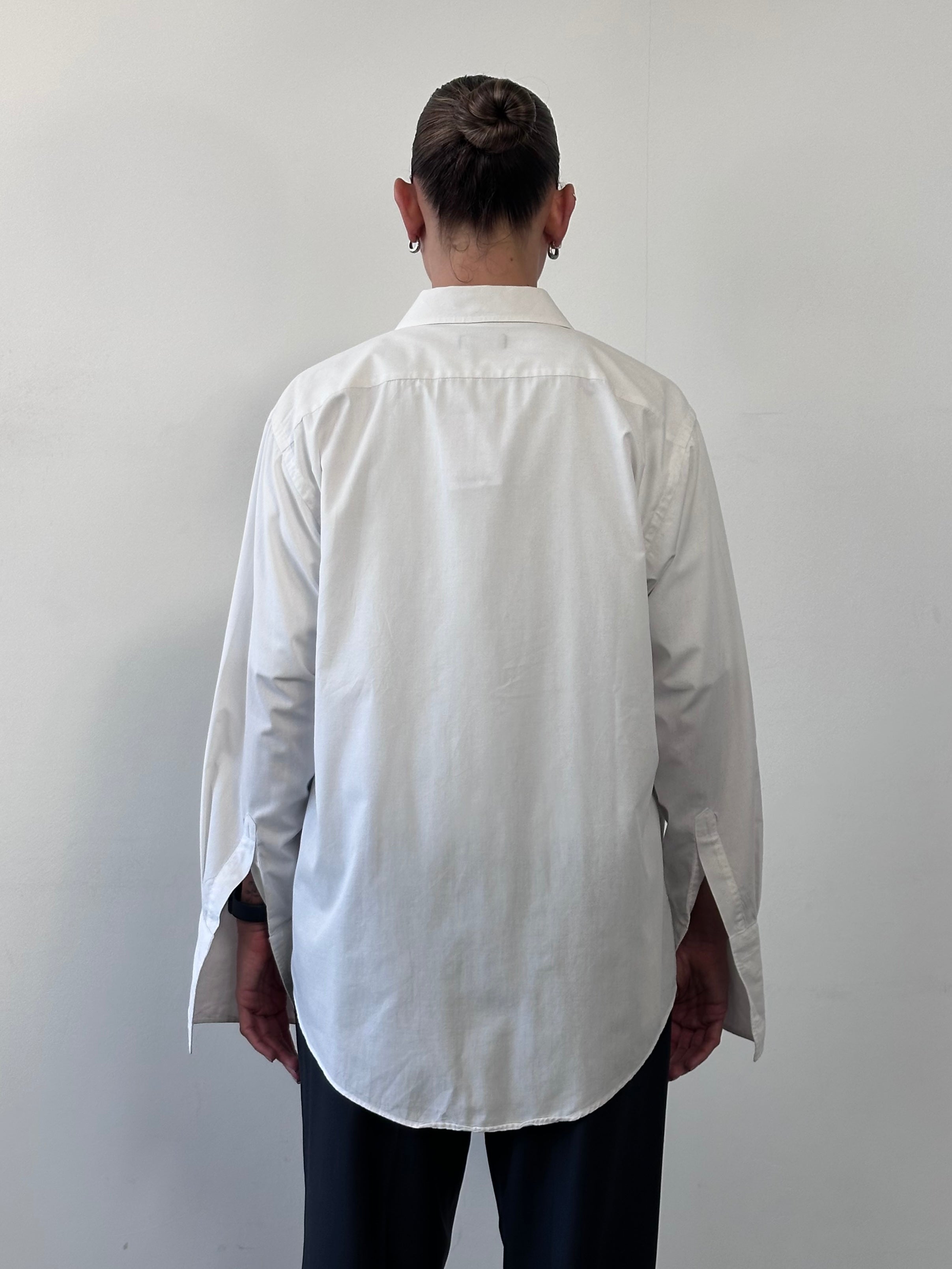 Christian Dior Monsieur cotton dress shirt in size L, shown in white with a classic collar and button-front design.