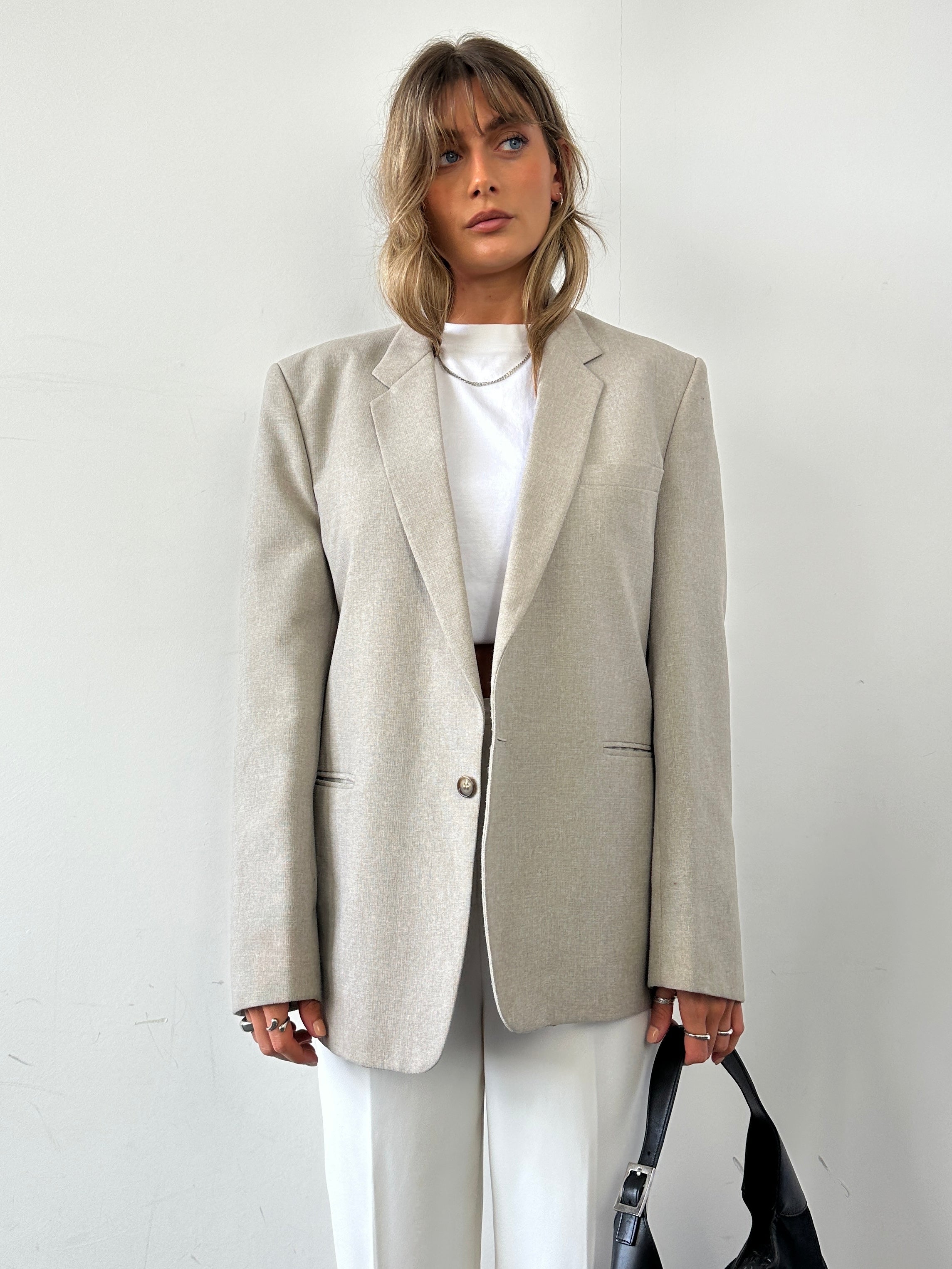 Vintage British vintage minimal blazer in size L, tailored blazer with classic lapel and sleek design, perfect for smart casual wear.