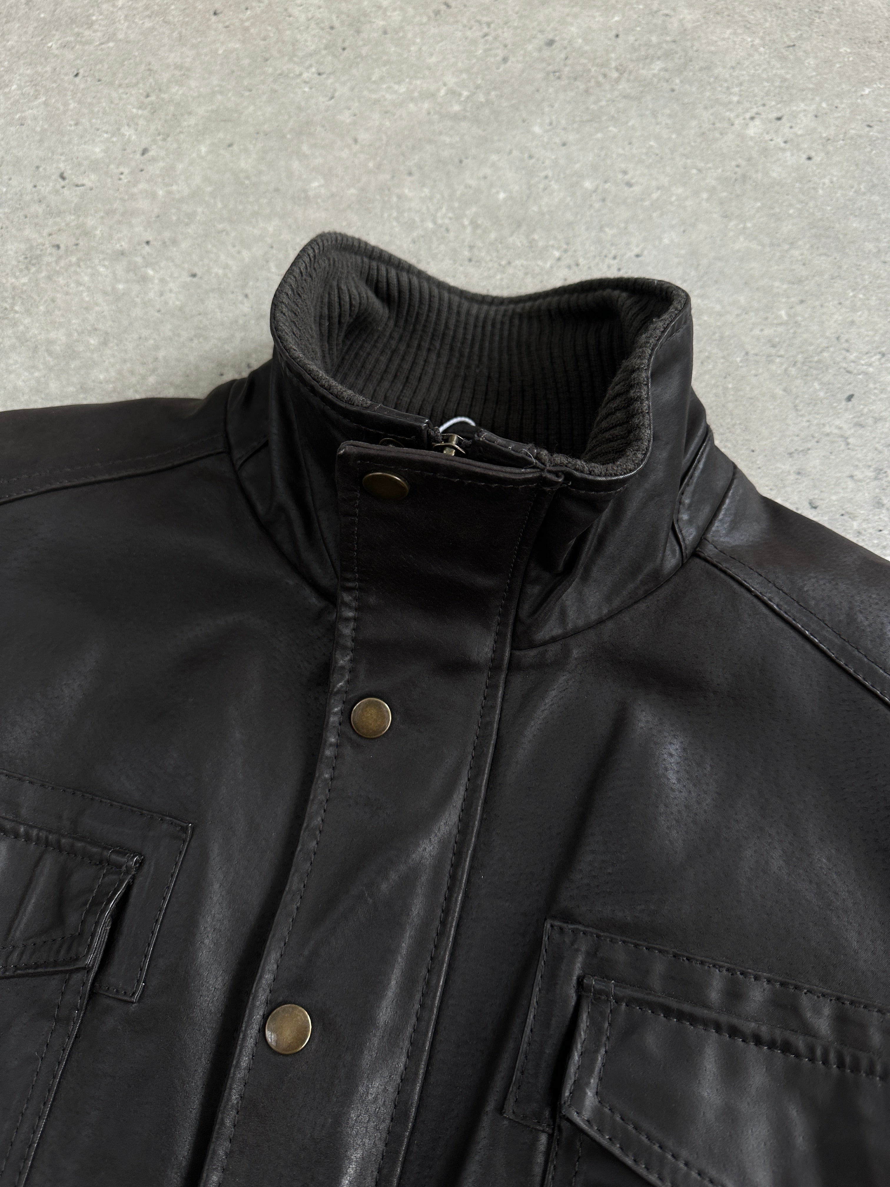 Vintage high neck leather jacket in size XL, featuring classic design and premium leather material.