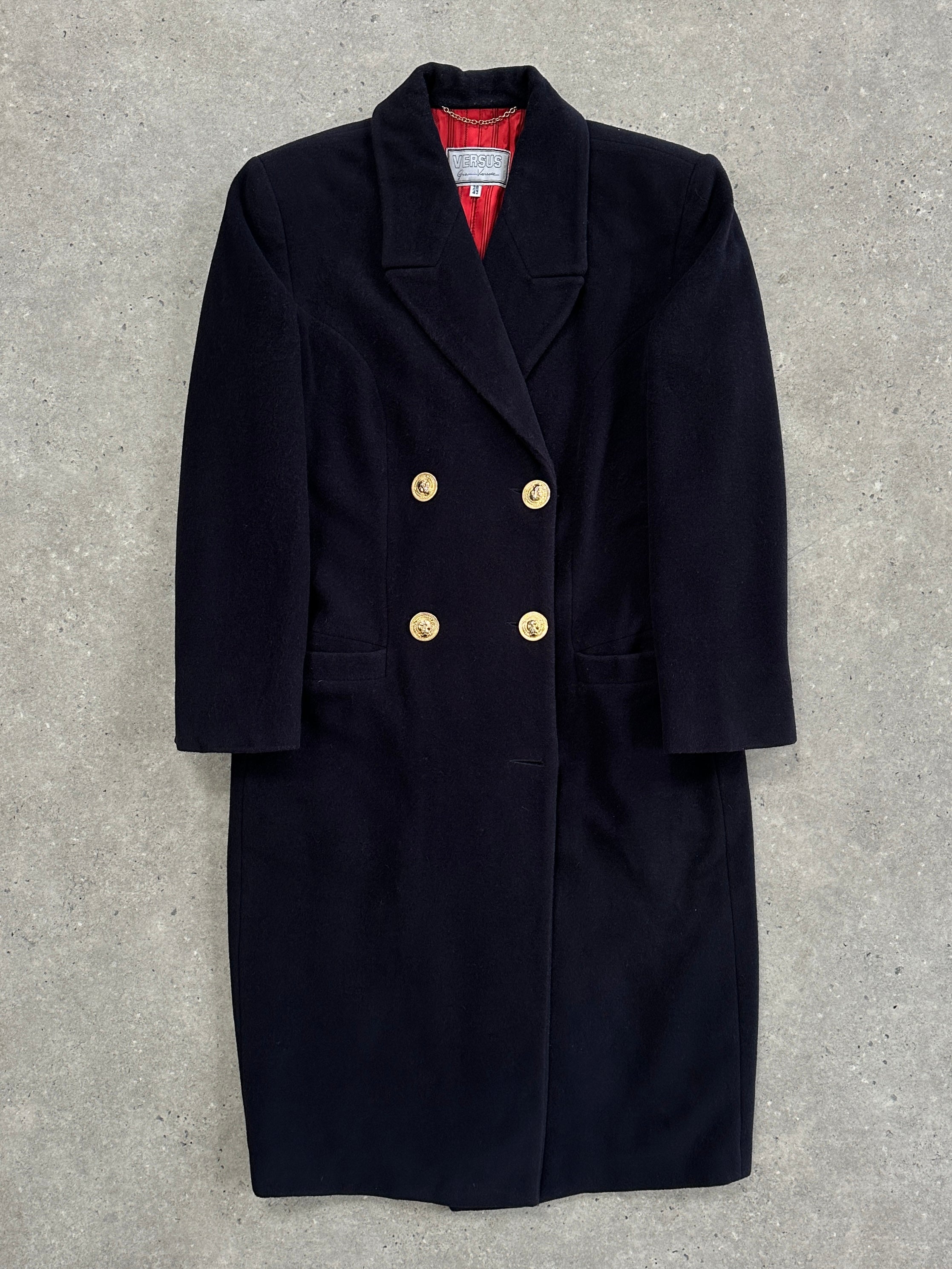 Versace Versus 1990s bespoke double-breasted coat, tailored fit, in classic wool fabric, featuring prominent buttons and lapel.