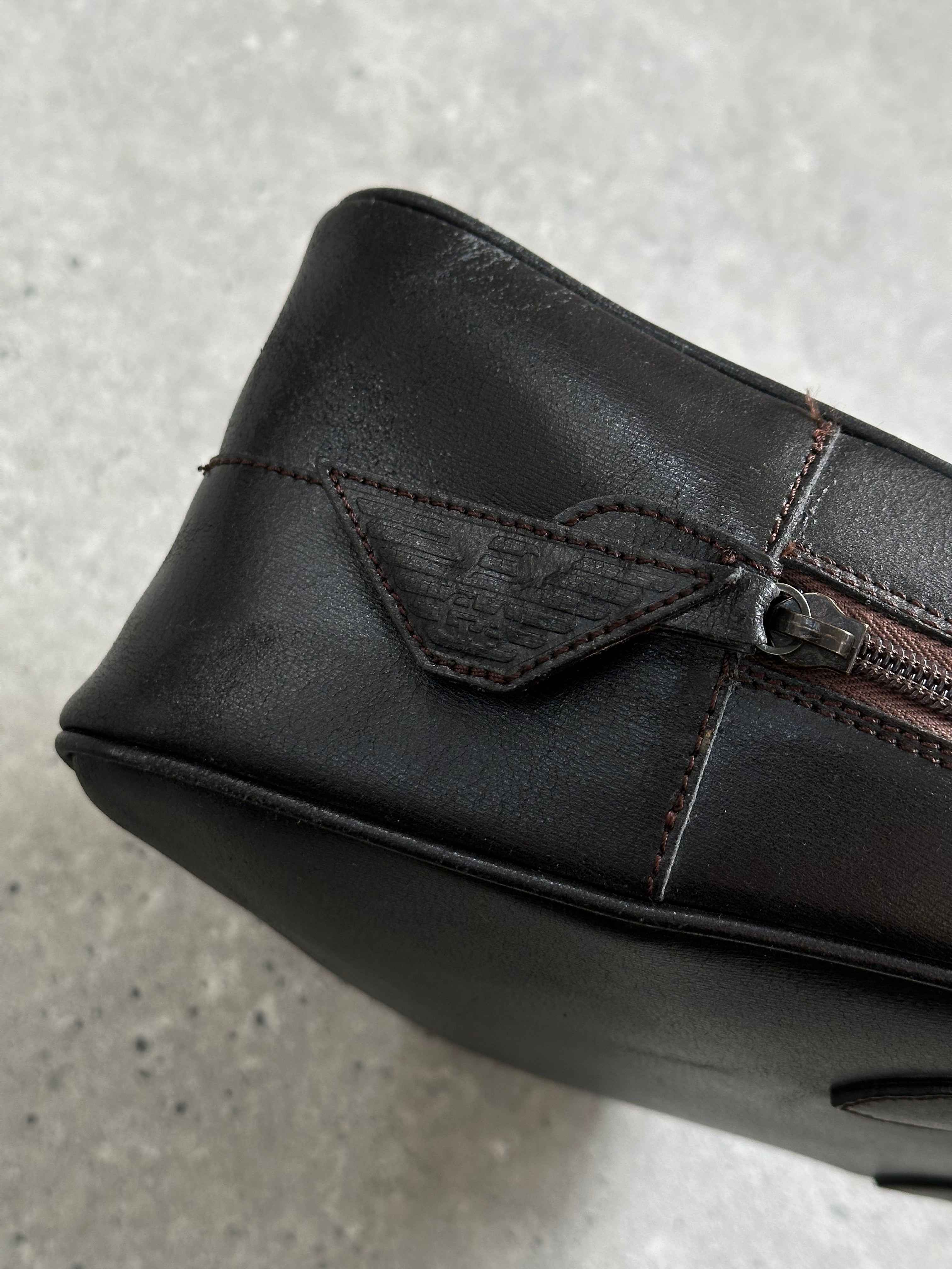 Emporio Armani 2000s leather handbag with top handles and sleek design, showcasing the classic luxury style of the brand.
