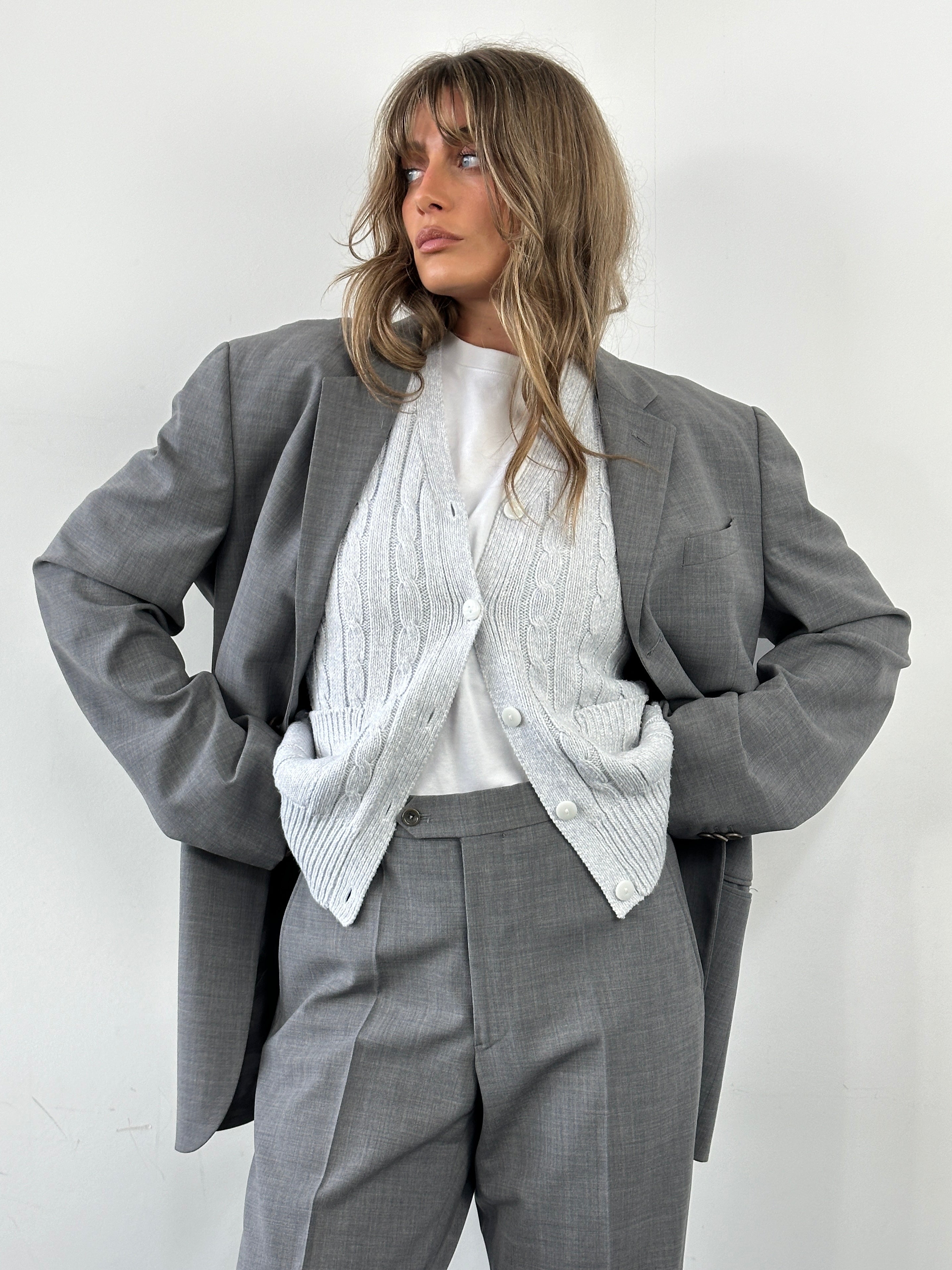 Armani Collezioni relaxed virgin wool single-breasted suit jumpsuit in size 40R/W32, displayed on a mannequin.