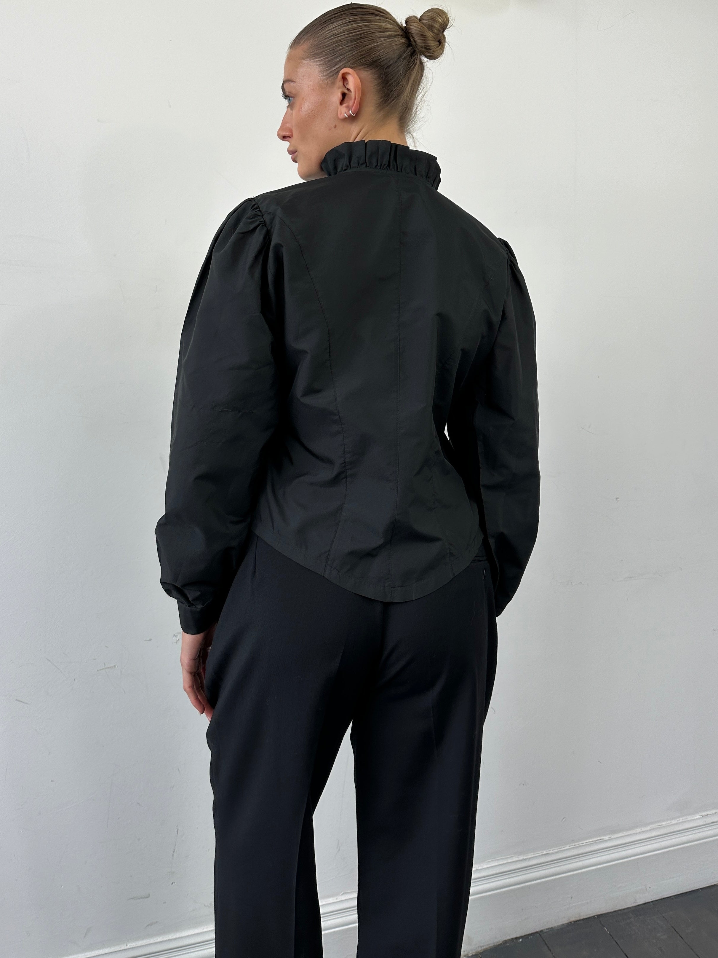 Vintage brand vintage puff sleeve pleated shirt, size M, with a classic collar and lightweight fabric, displayed flat on a neutral background.