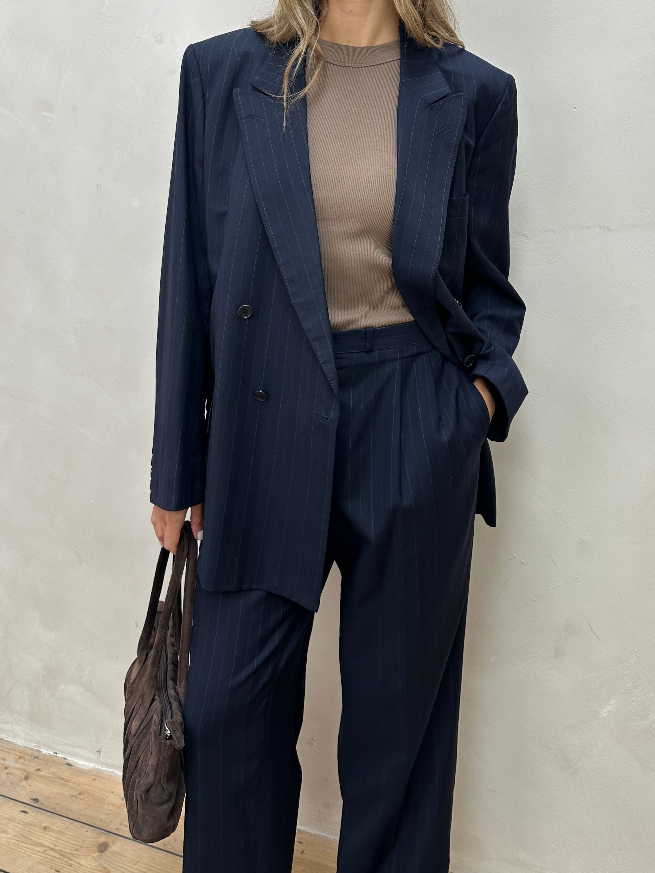 Christian Dior pinstripe pure wool double-breasted suit jumpsuit in size 44R/W34, tailored with classic style and elegant details.