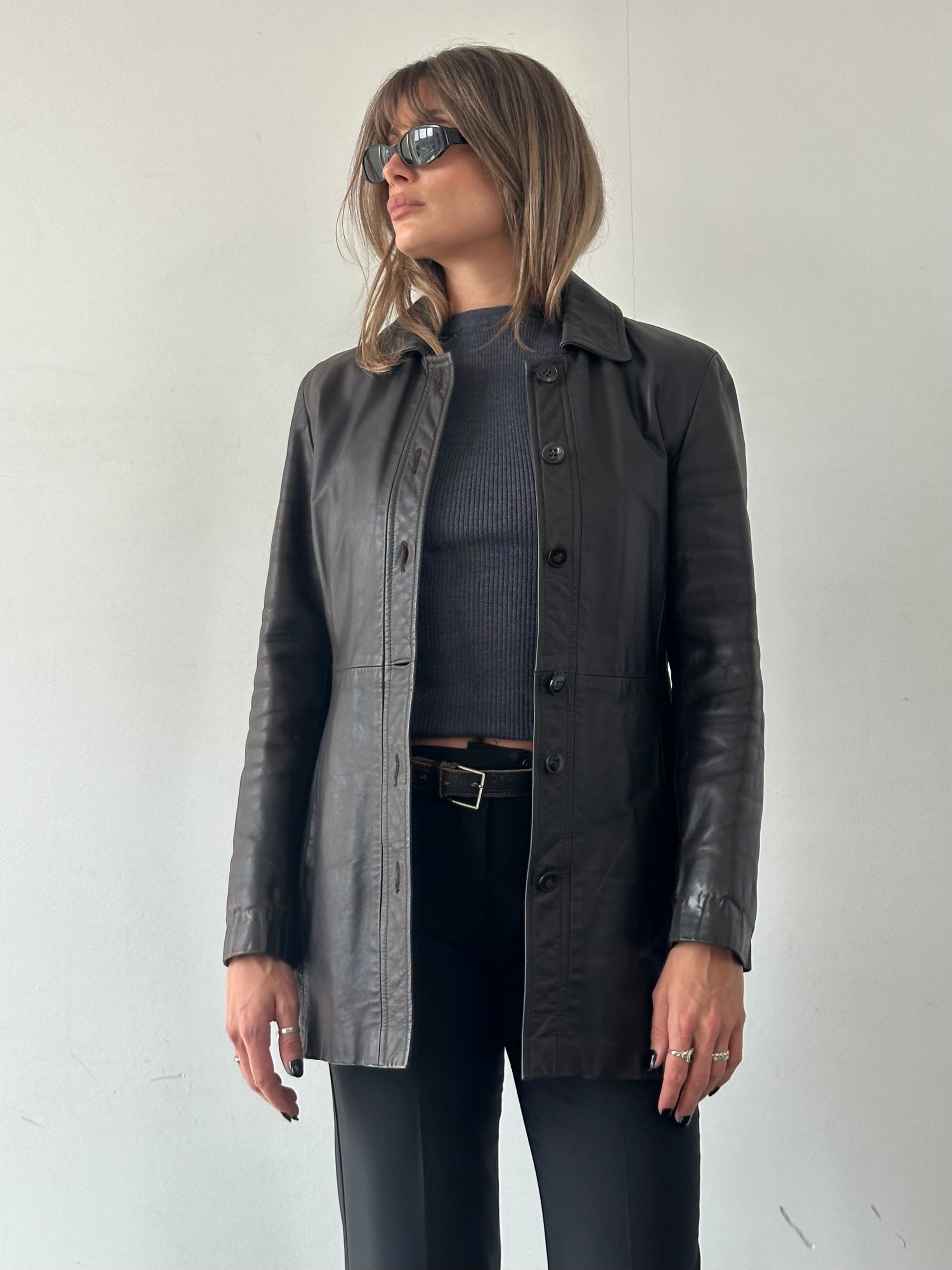 Emporio Armani leather jacket in size S showing a sleek black leather design with a classic collar and front zipper.