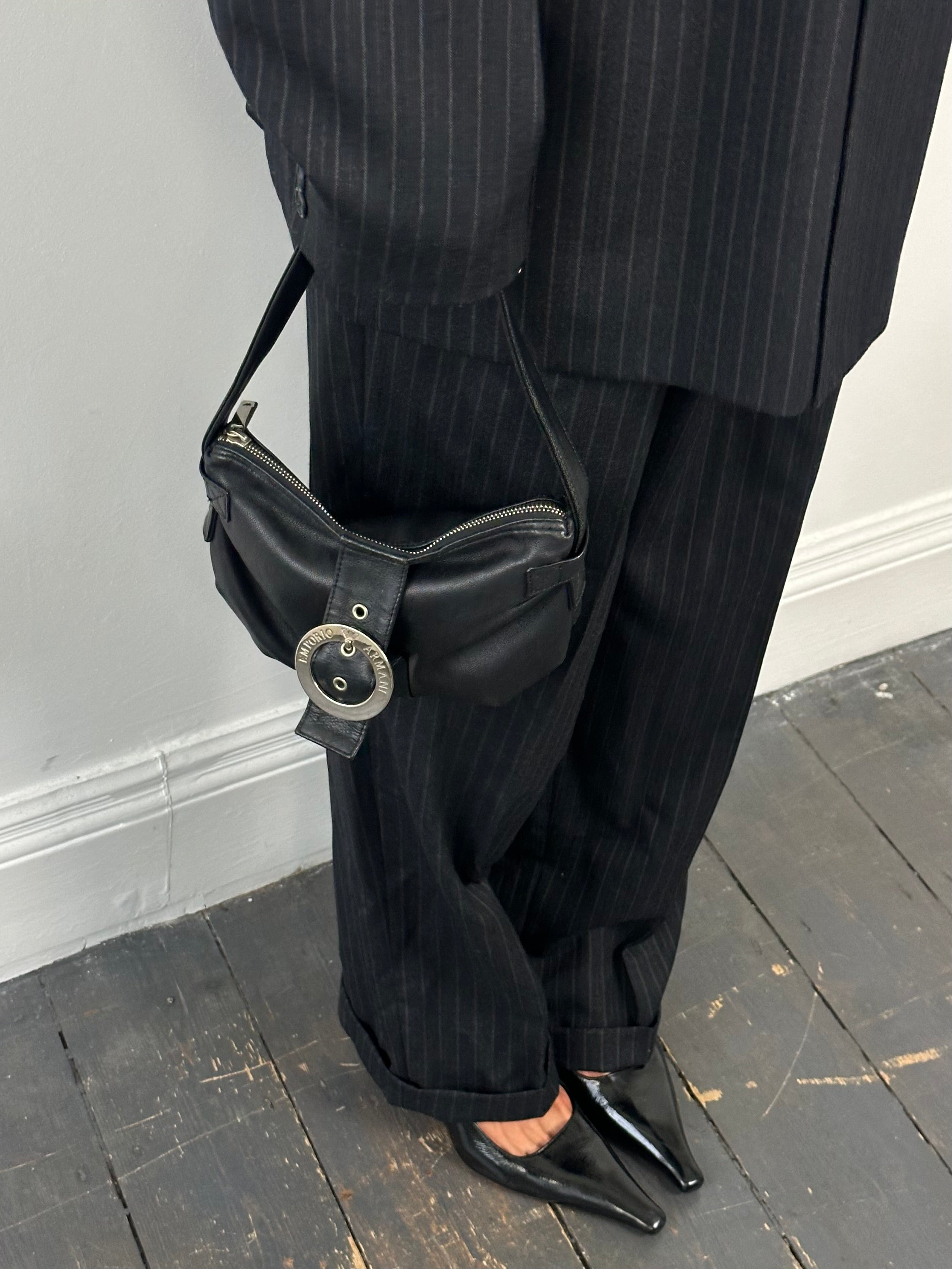 Emporio Armani leather shoulder bag with sleek design, featuring a smooth finish and adjustable strap for stylish everyday use.