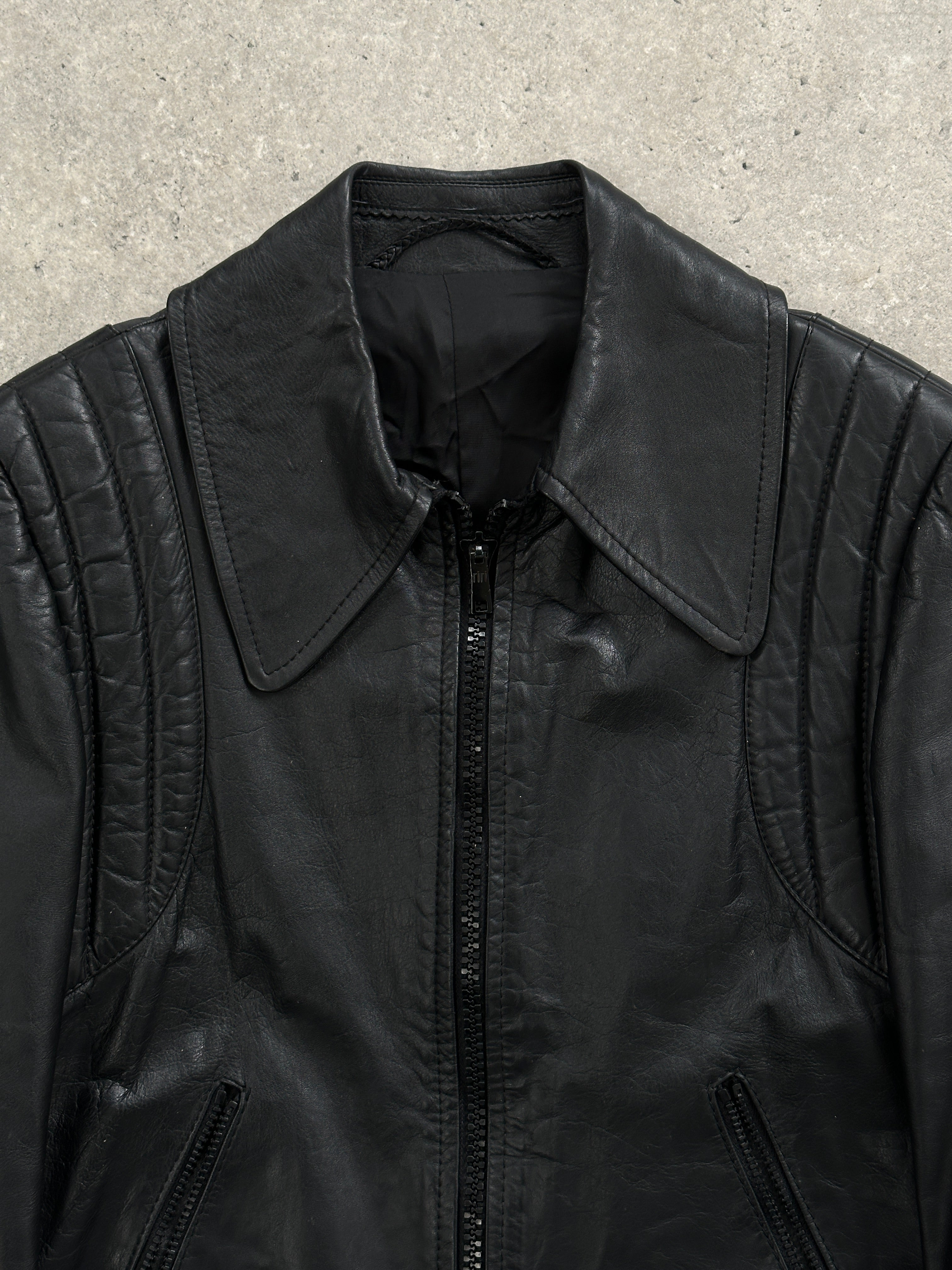 Vintage Italian quilted leather jacket in XS with detailed stitching and classic design.