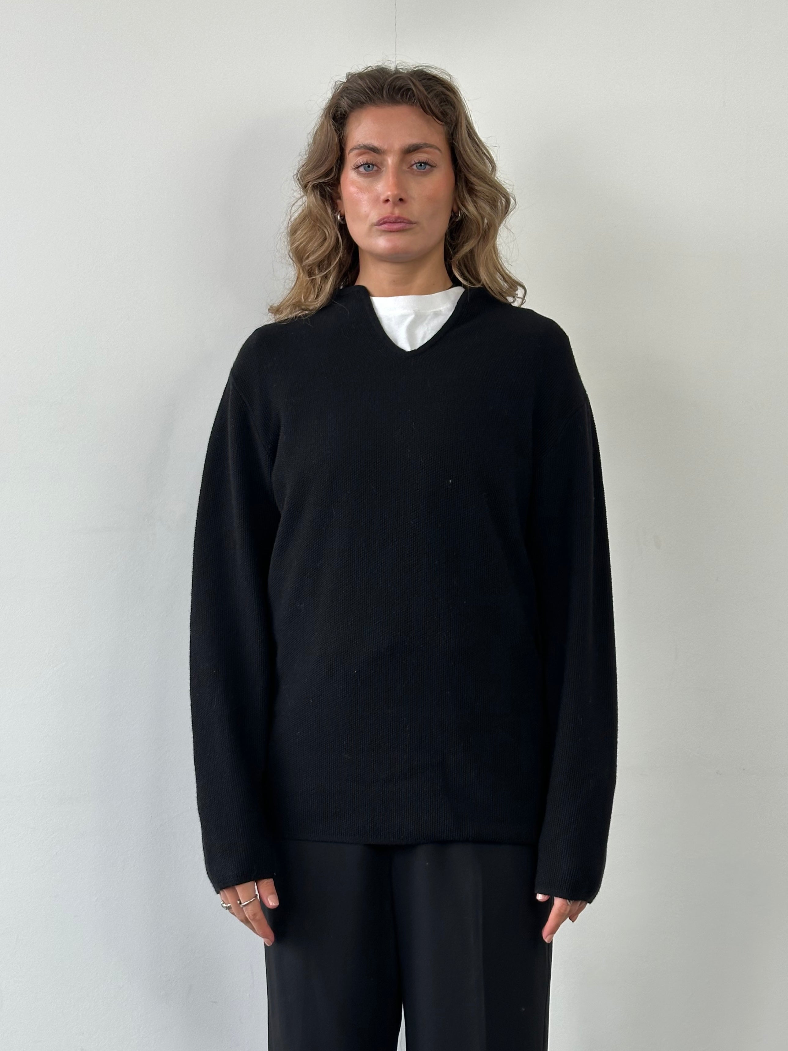 Emporio Armani pure wool knitted jumper in size M/L, featuring a classic design and soft wool texture.
