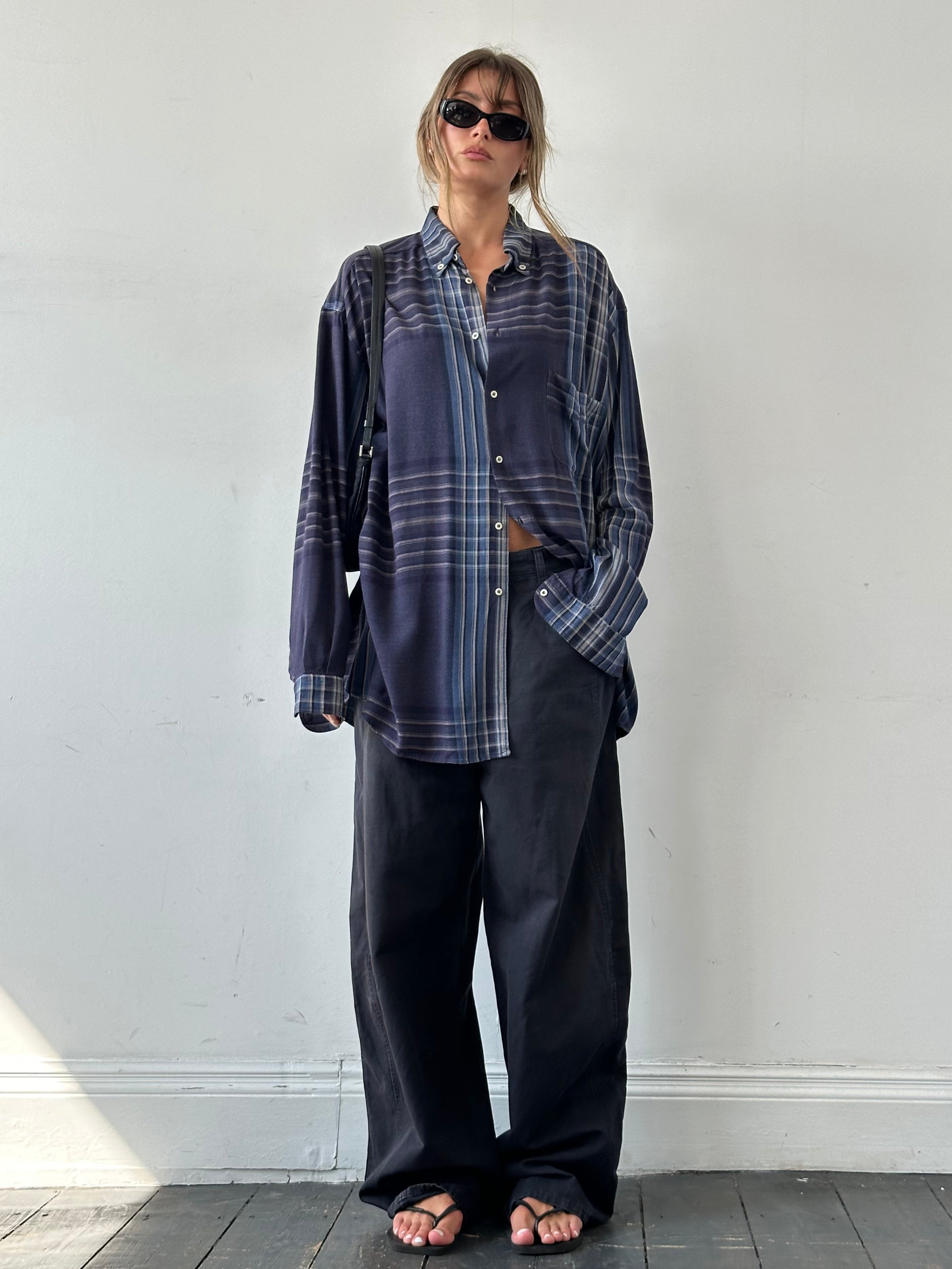 Armani Jeans cotton wide-leg trousers in size W32, shown in a natural light, featuring a relaxed fit and classic style.