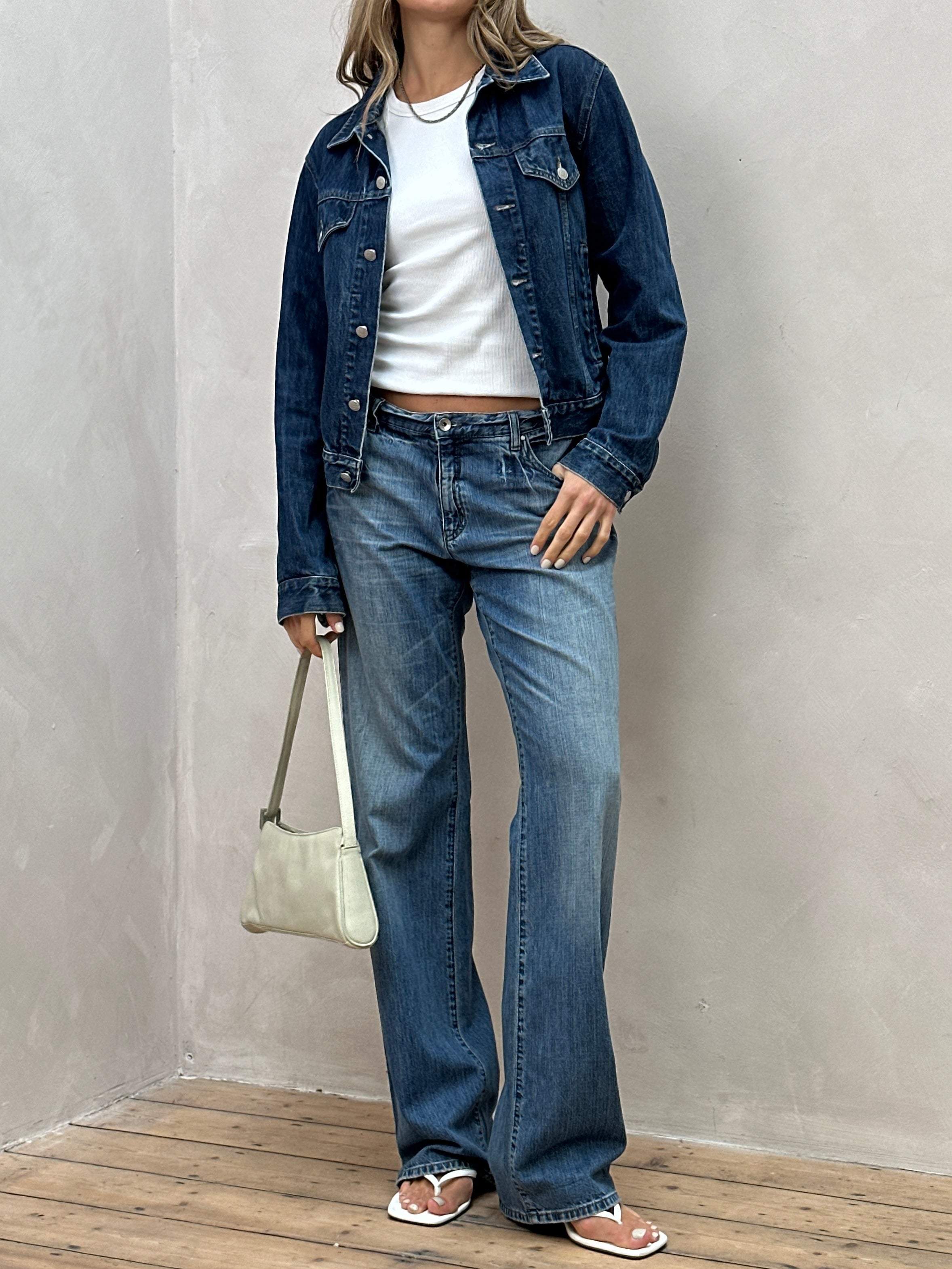 Armani jeans mid wash denim jacket in size S/M, featuring classic style and button-front design with chest pockets.