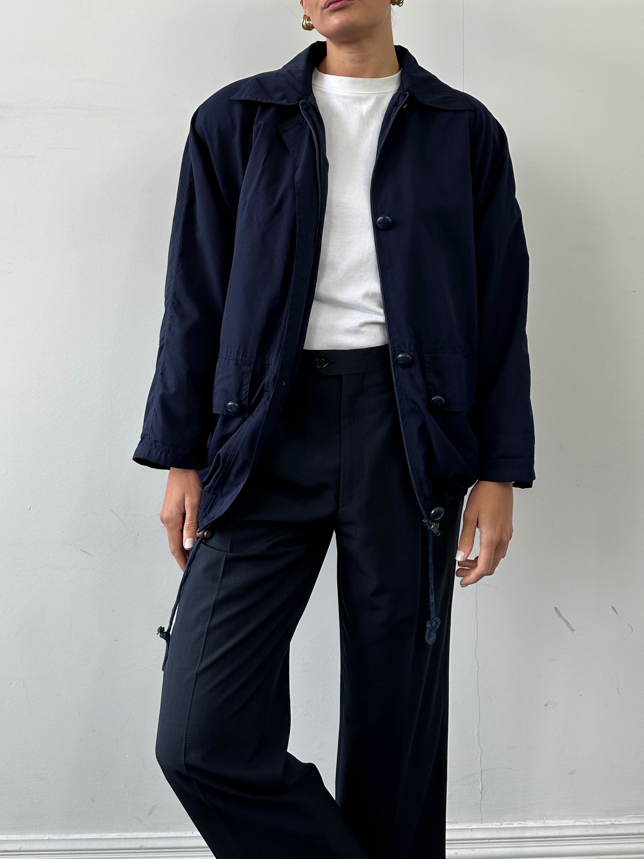Vintage Italian bomber jacket in size M/L, featuring classic design, ribbed cuffs, and a stylish retro look.
