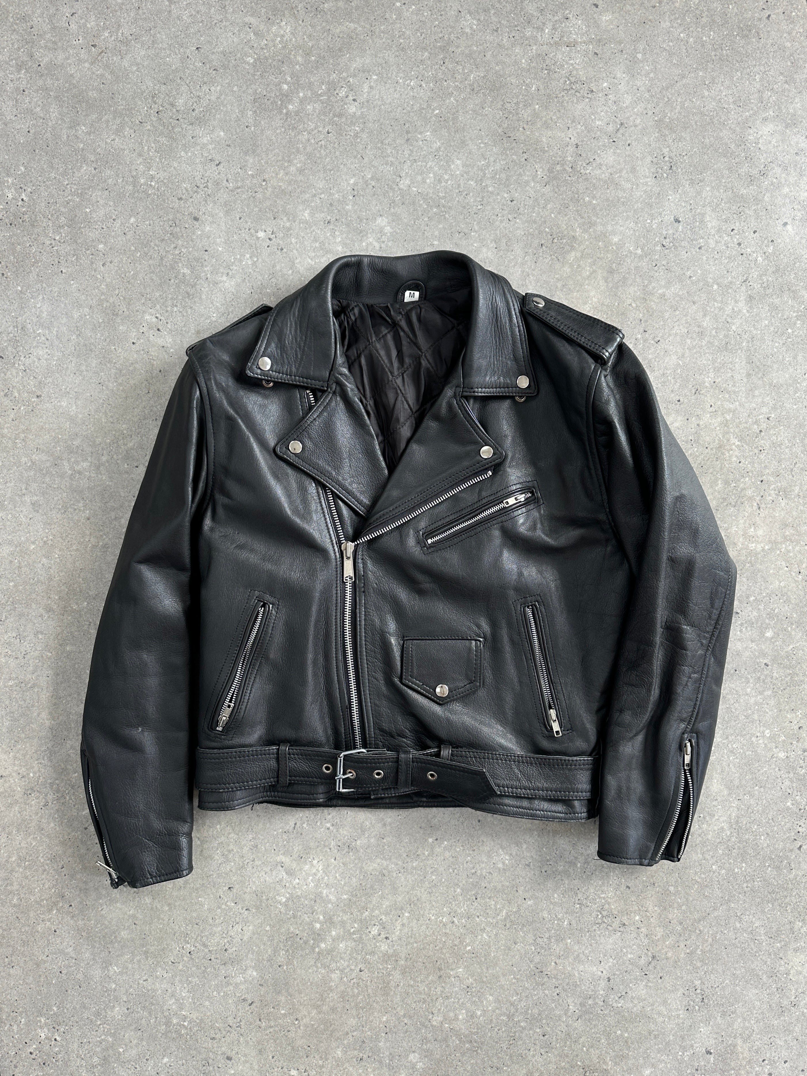 Vintage 1990s leather biker jacket in size M, featuring classic distressed leather and rugged style.