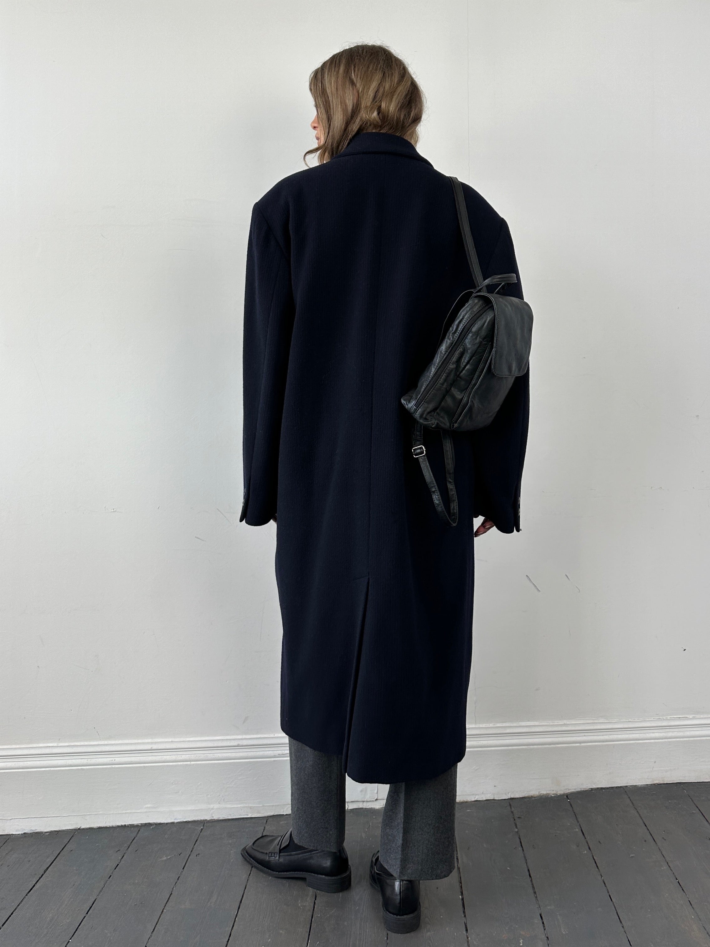 Versace wool and cashmere double-breasted coat in XL, stylish and tailored, displayed on a hanger.