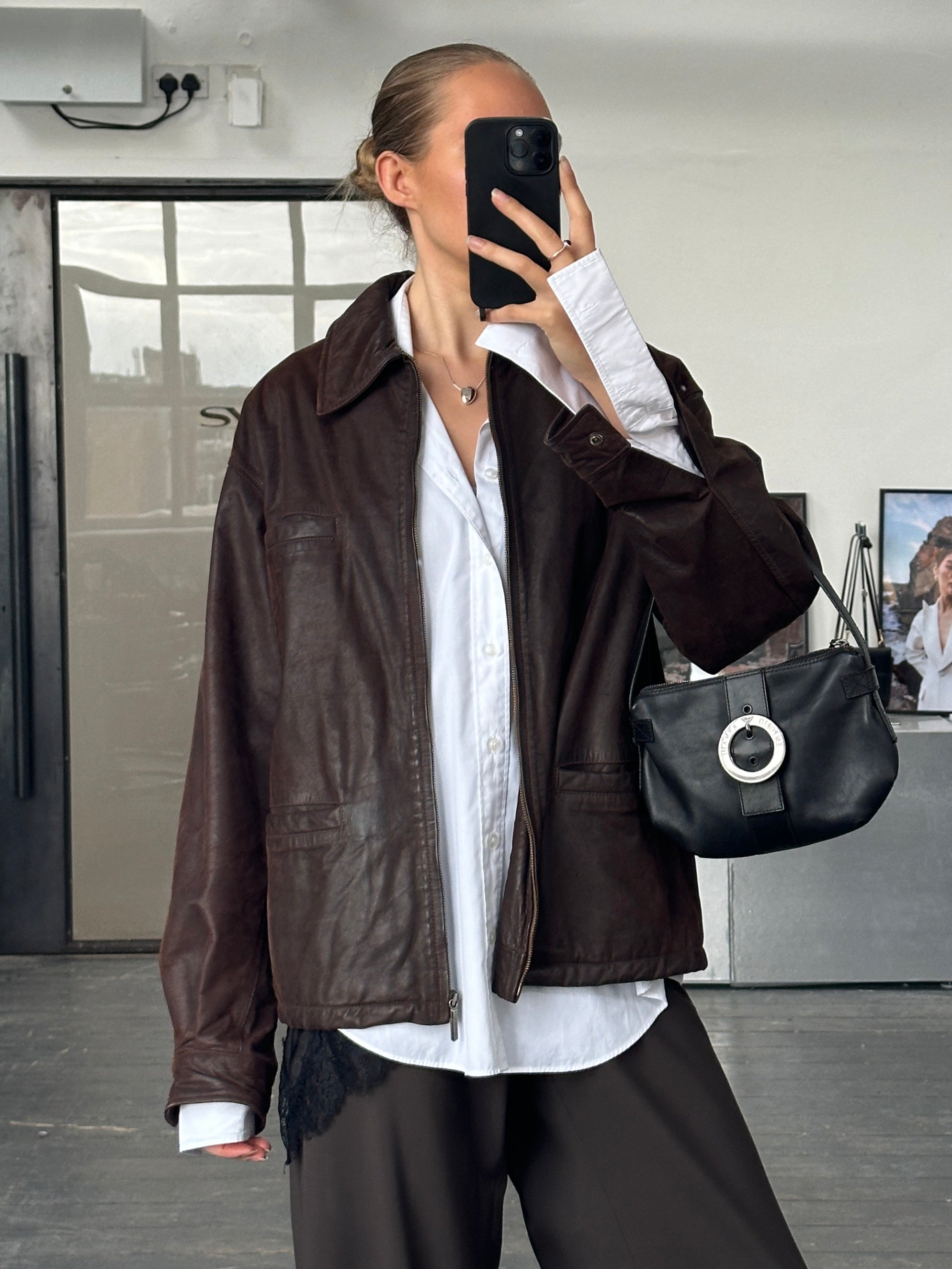 Versace Jeans Couture 1990s boxy leather jacket in black, featuring classic design and textured leather, size large.