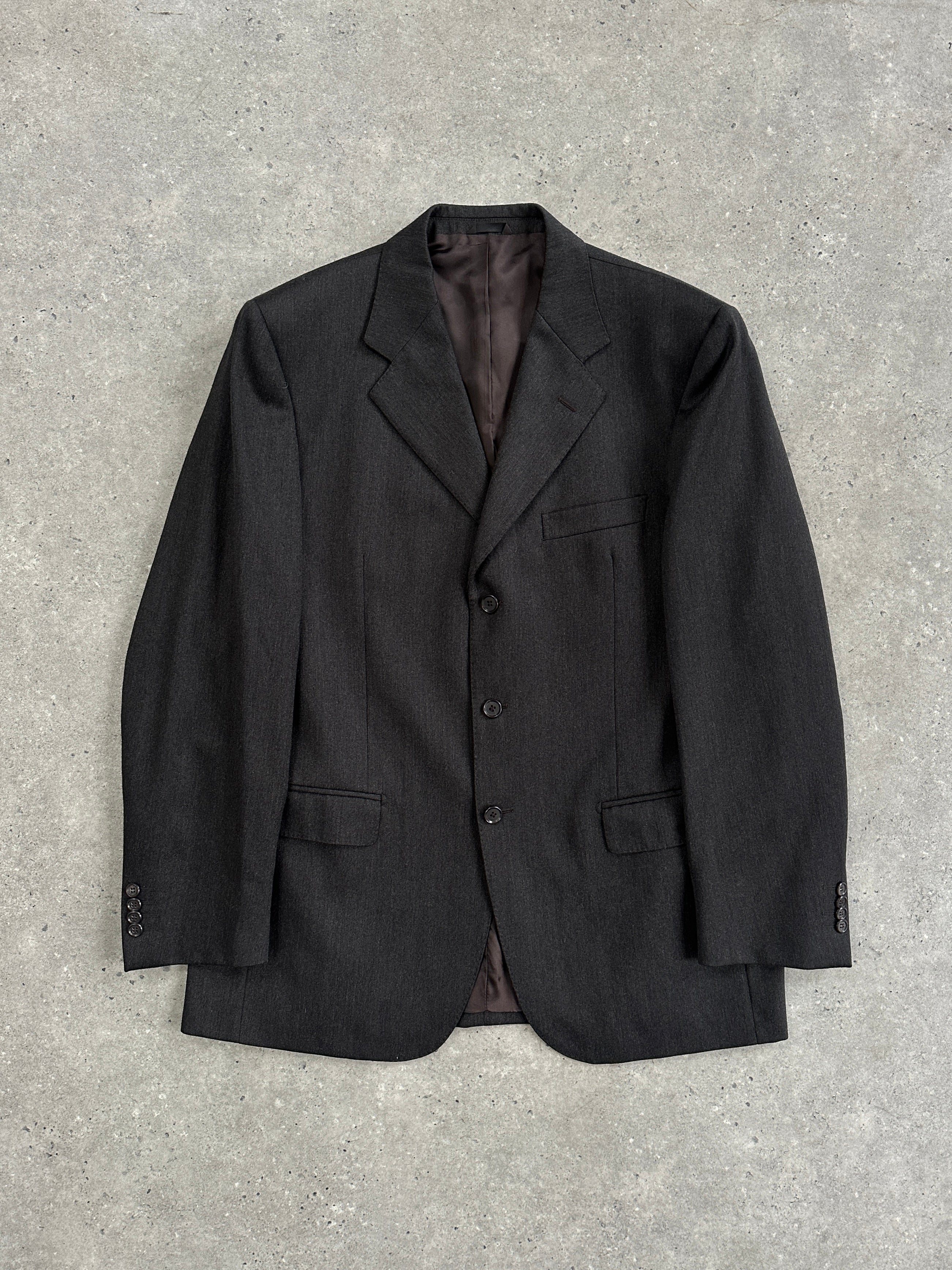 Vintage pure Merino wool single-breasted blazer in size 44R/XL, tailored fit, classic style, in a neutral color.