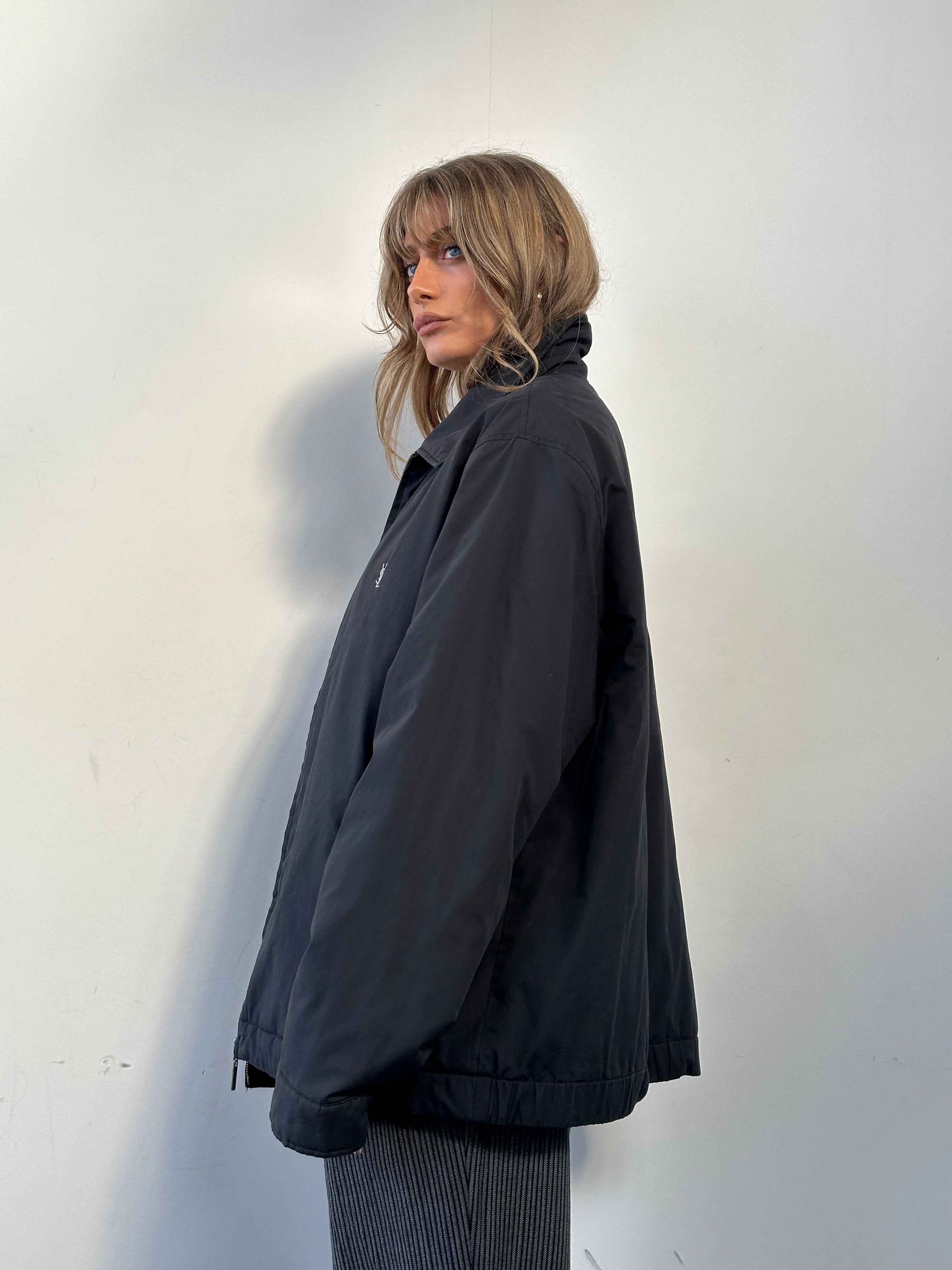 Yves Saint Laurent Harrington Jacket in XXL, black stylish jacket with structured design and classic collar, front view.