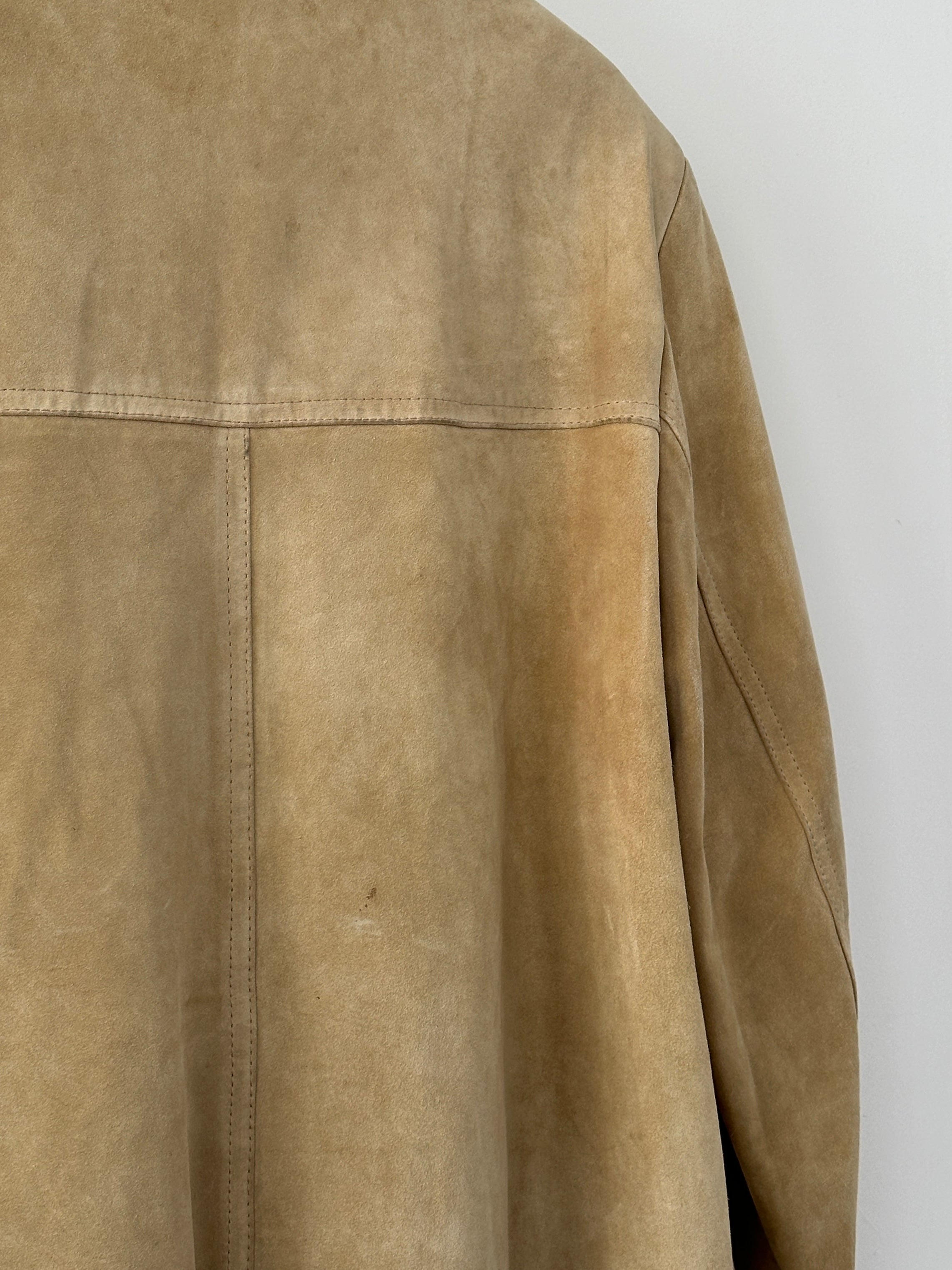 Vintage boxy suede jacket in size L/XL, featuring a classic design with a soft, textured suede exterior and tailored fit.