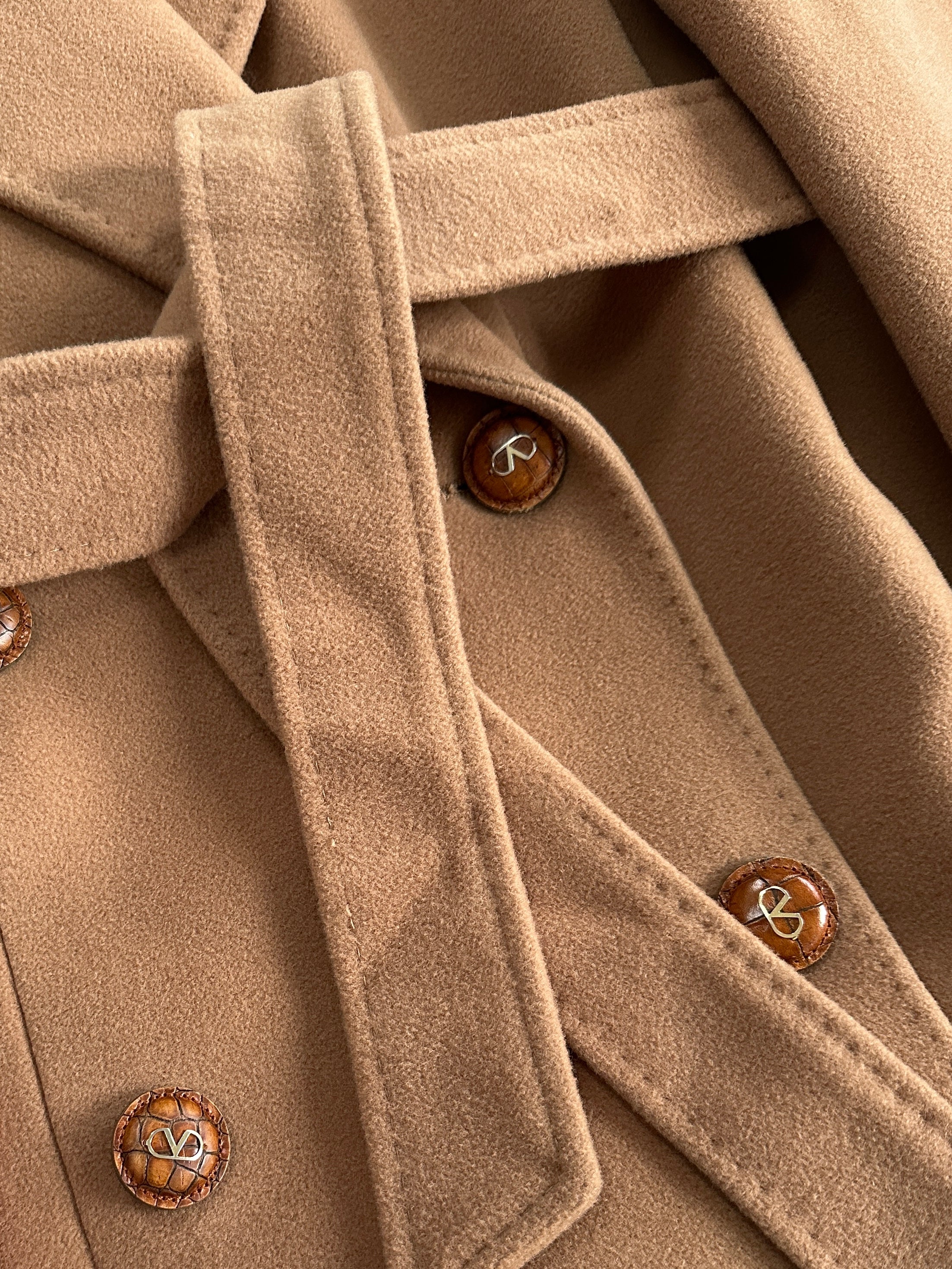 Valentino 1990s pure wool double-breasted belted coat in beige, featuring tailored design and classic buttons, size L.