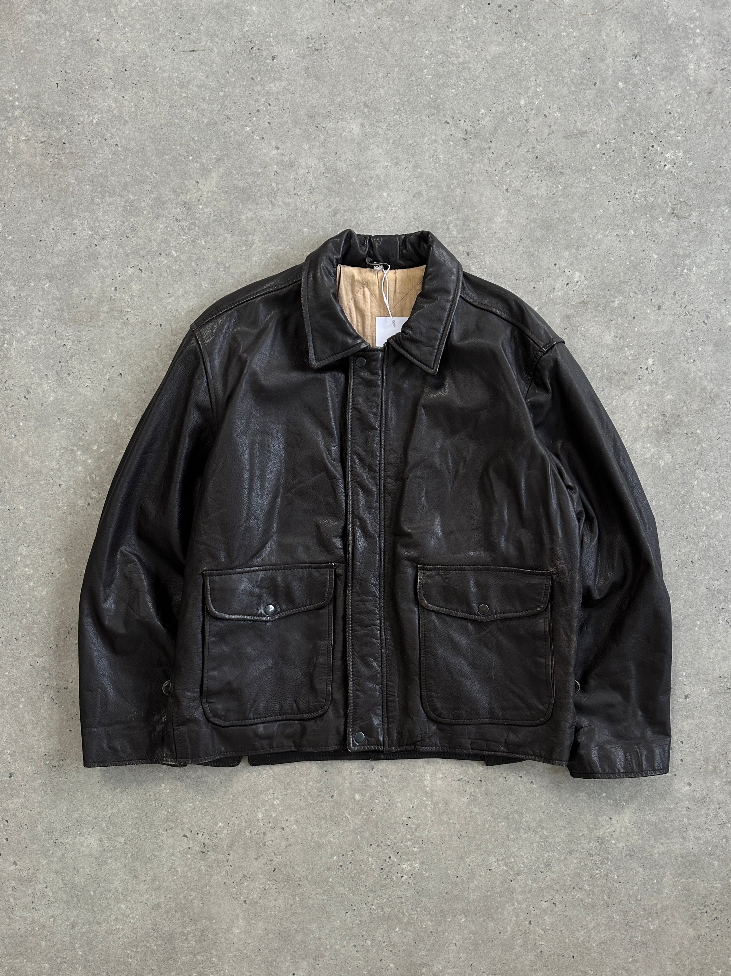 Vintage minimal leather zip-up jacket in XL, showcasing sleek design and classic style with a smooth leather finish.