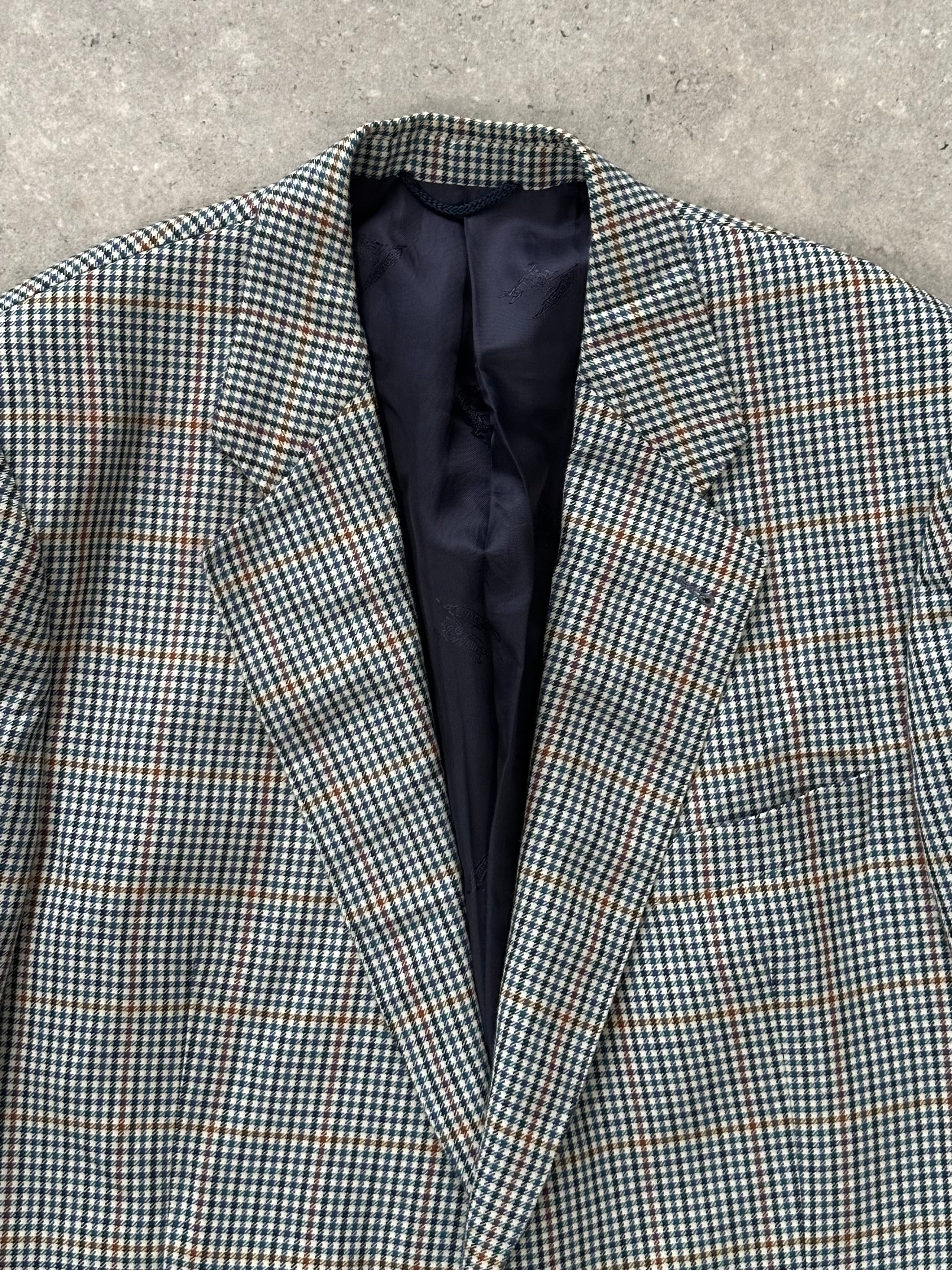 Burberry 1990s check wool blazer, single-breasted, in size 44R/XL, featuring classic plaid pattern and tailored fit.
