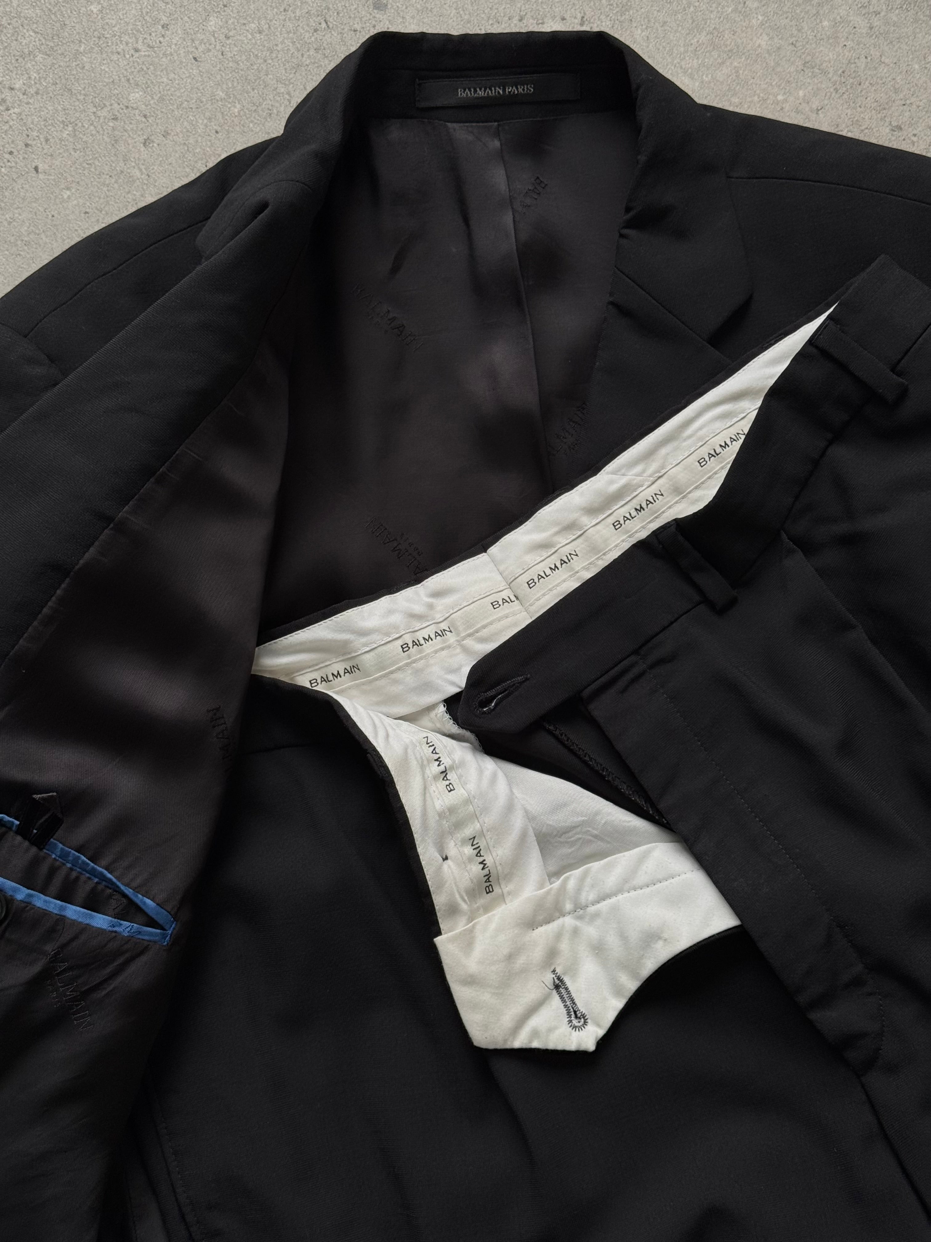 Balmain 1990s pure wool single-breasted suit in size 42S/W34, tailored fit with classic lapels and structured design.