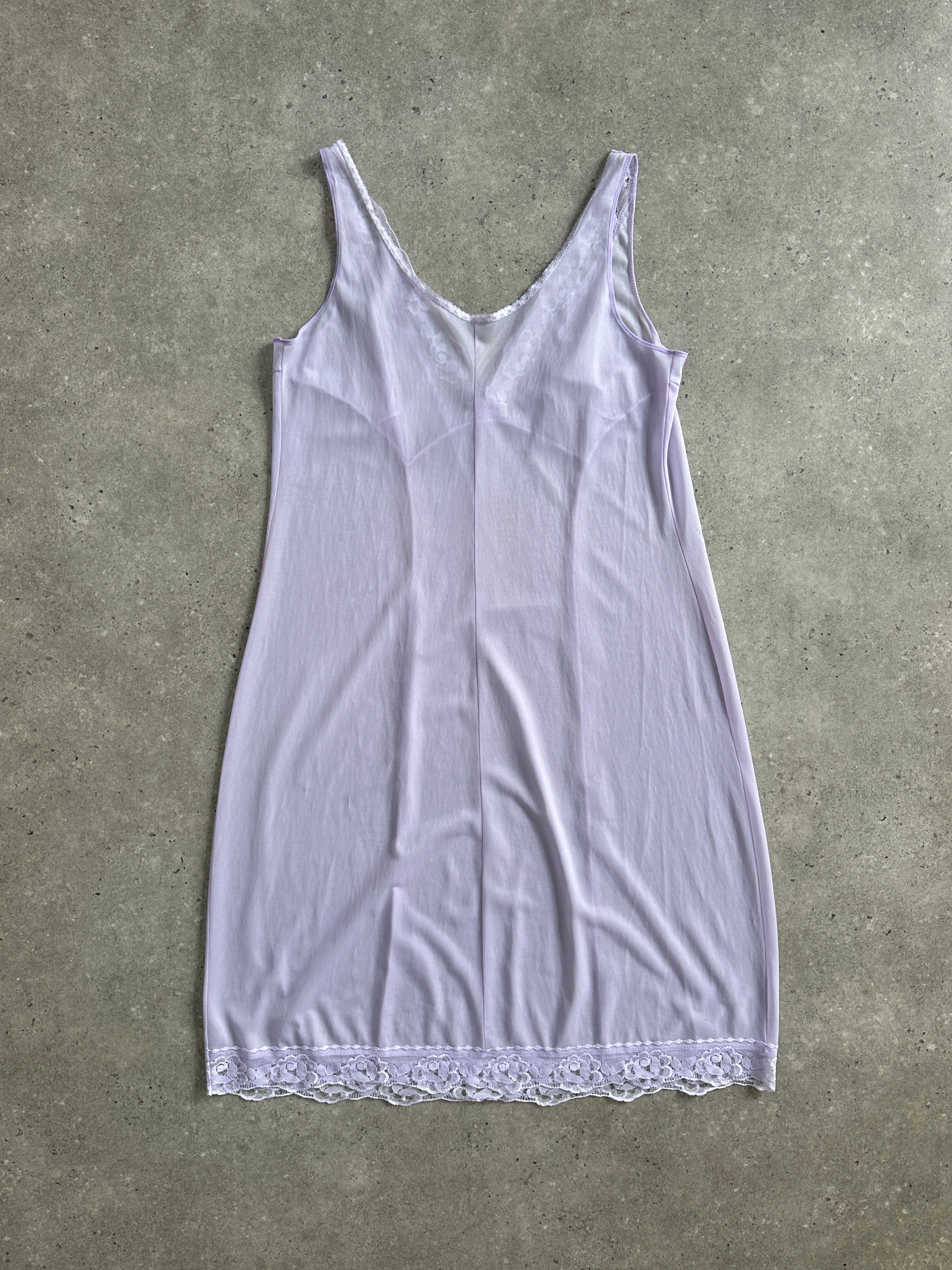Vintage 2000s lace sheer midi slip dress in size large, featuring delicate lace details and a flowy silhouette.