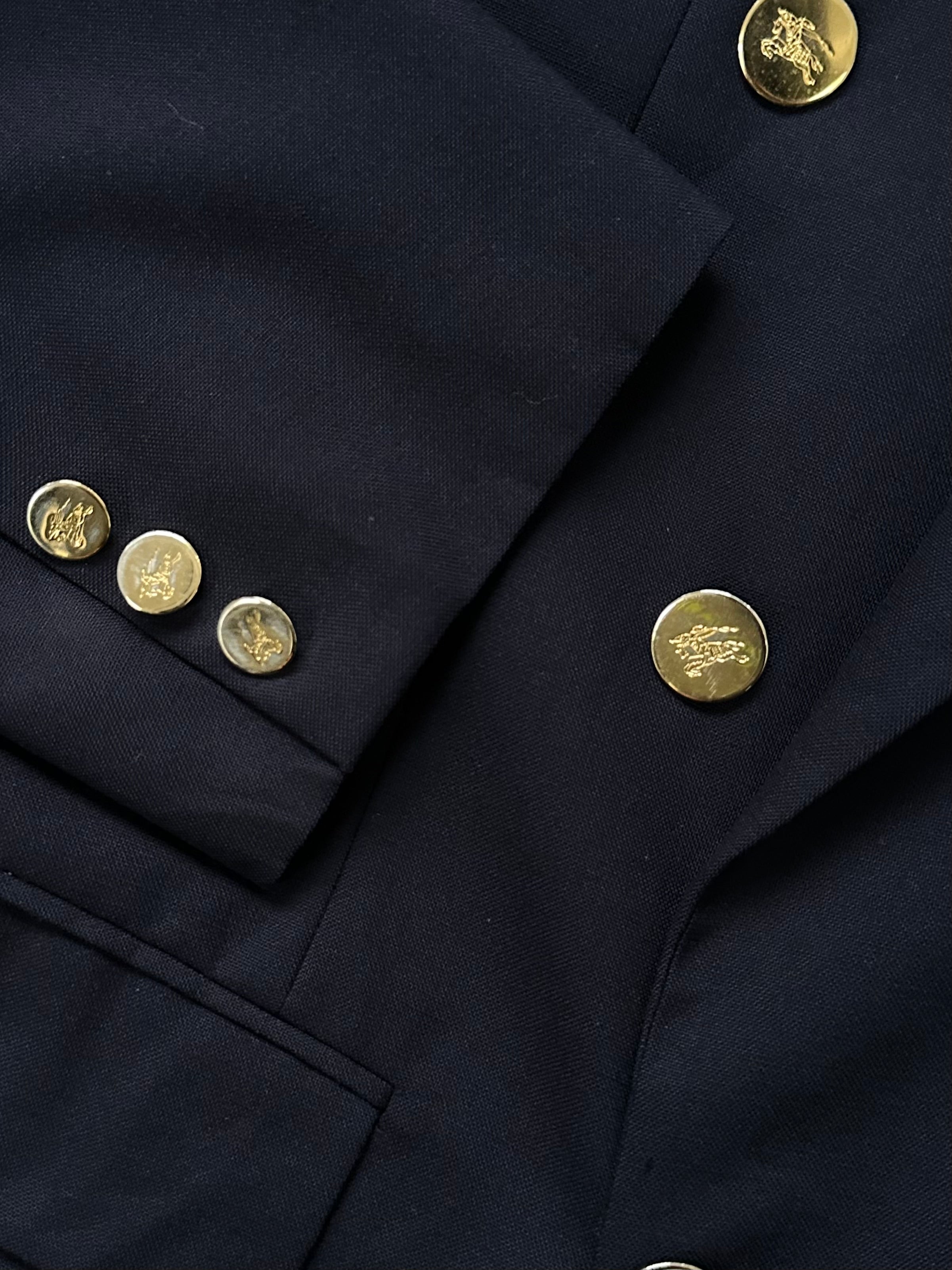 Burberry 1990s double-breasted pure wool blazer in size 42R/XL, classic tailored design with branded buttons and structured lapels.