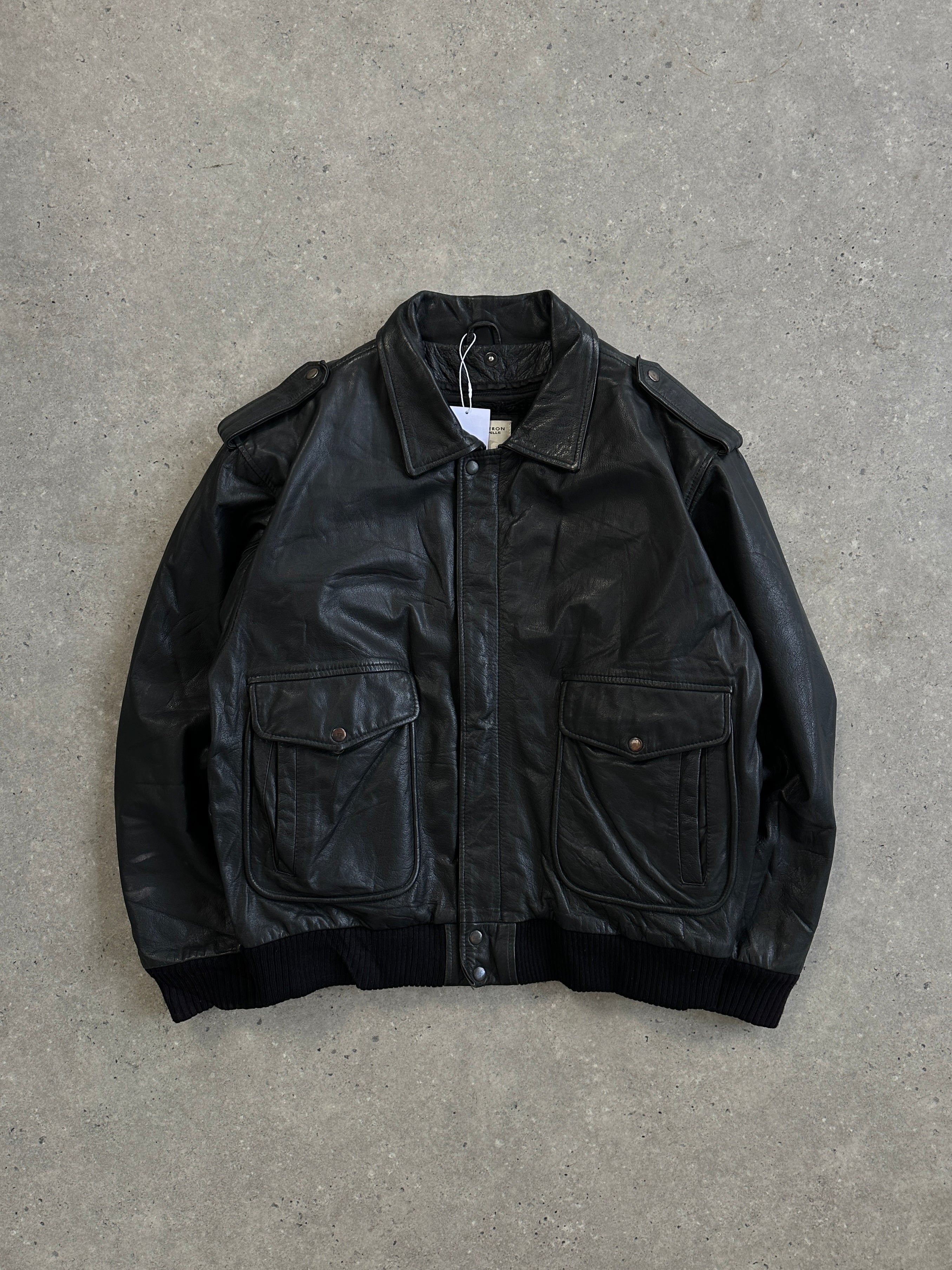 Conbipel removable fleece-lined aviator leather bomber jacket in size L/XL with classic design and adjustable cuffs.