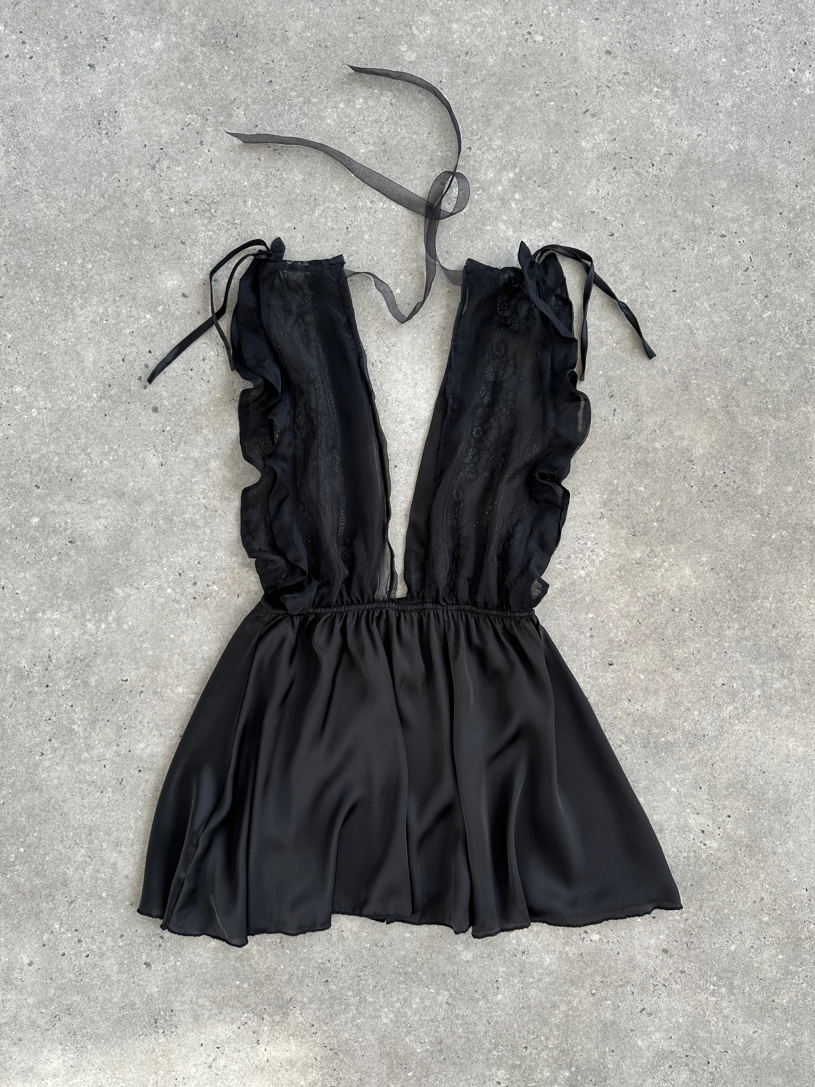 Vintage 2000s lace sheer satin babydoll top in size M, featuring delicate lace details and a silky smooth finish.